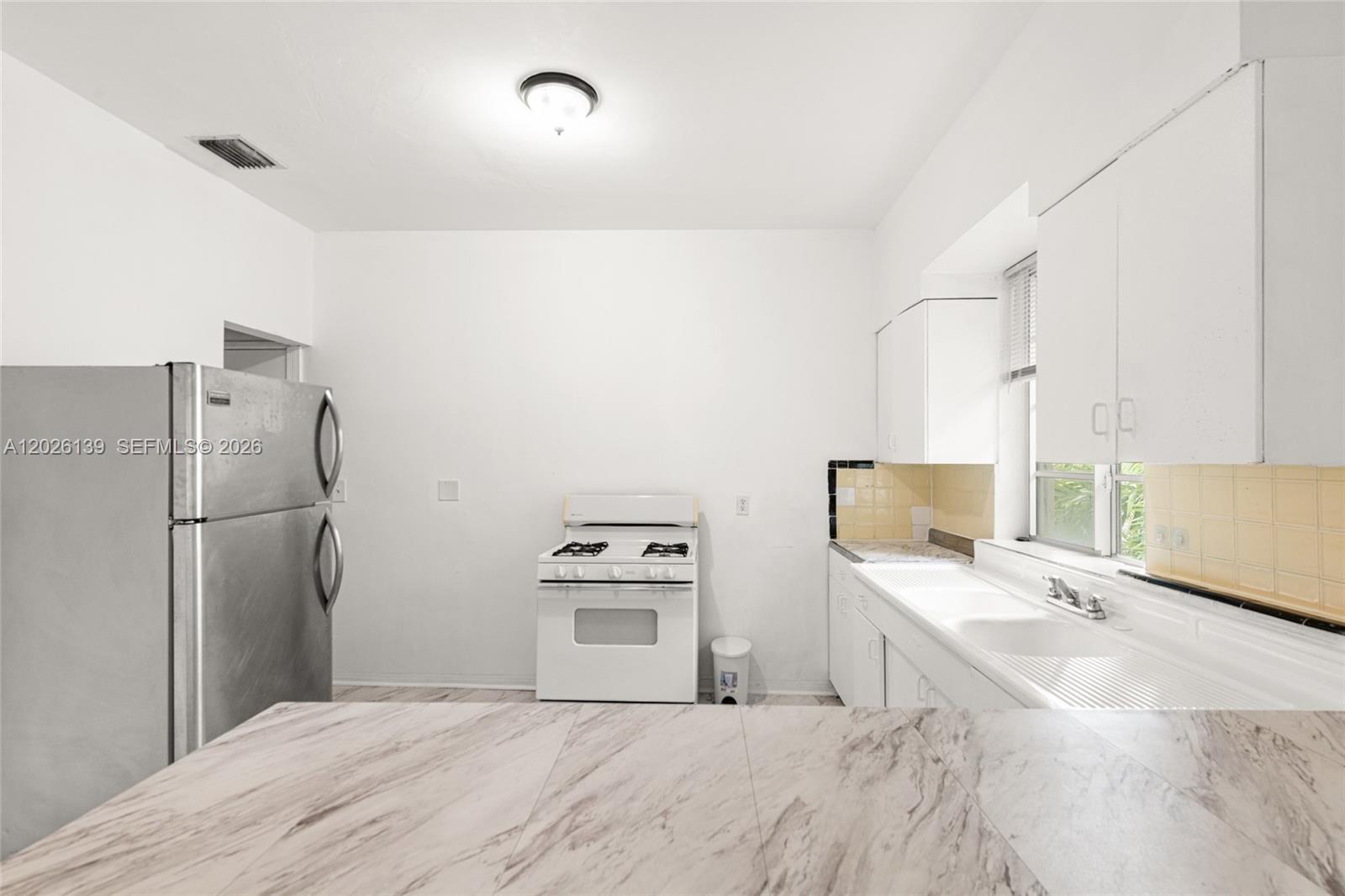 ALTON BEACH BAY FRONT RE- - Residential