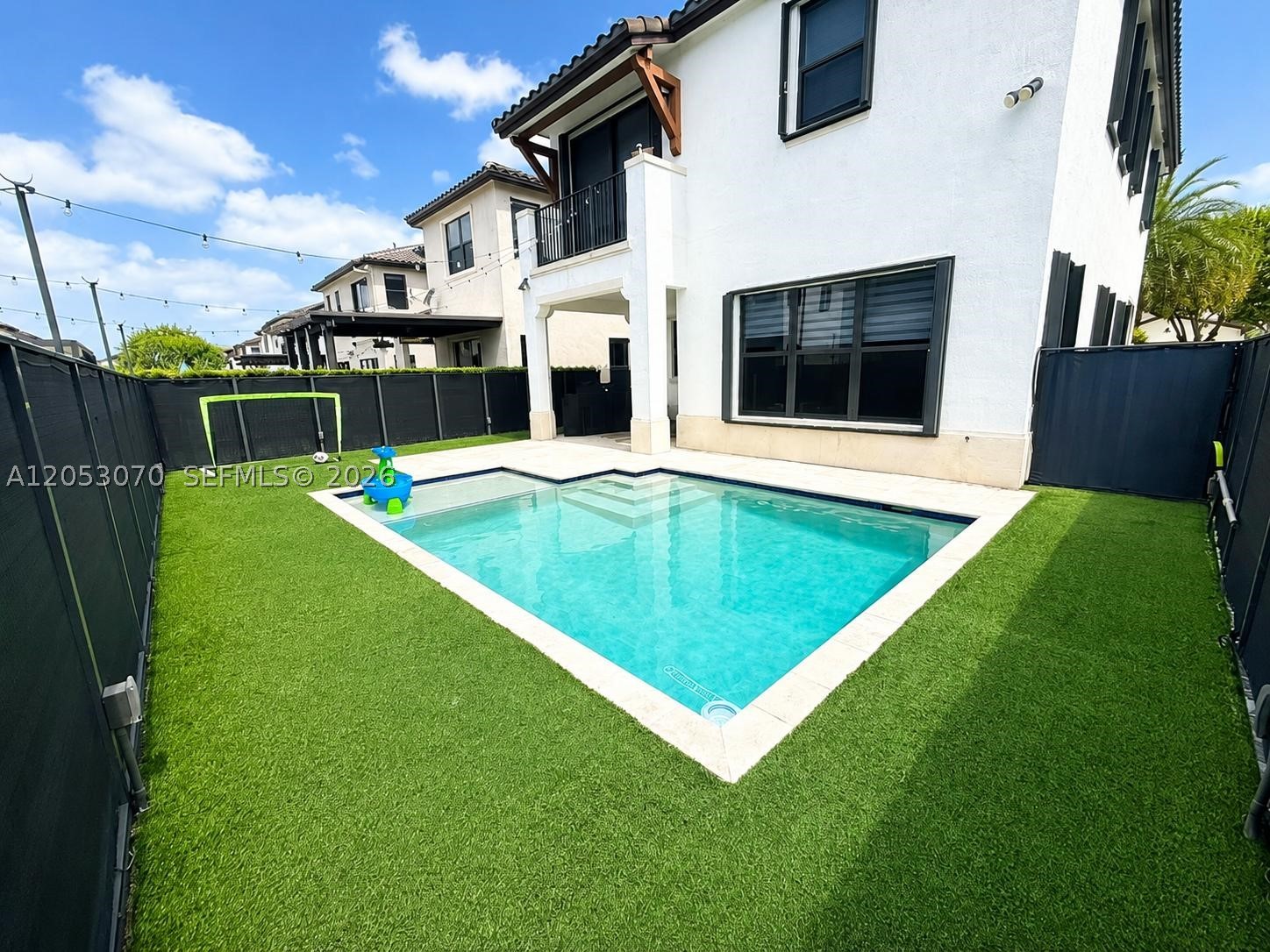 Rare opportunity to lease a beautifully maintained 4-bedroom, 2.5-bath home with a private pool in the highly desirable gated community of Bonterra. Bright and spacious, this home features an open-concept layout, a modern kitchen with stainless steel appliances, generous living areas, and four comfortable upstairs bedrooms with walk-in closets.

A unique highlight is the air-conditioned garage conversion, finished with wood laminate flooring, creating the perfect flex space for a game room, media room, home office, gym, playroom, guest room or in-laws while providing additional storage and 2-driveway parking spaces with a EV car charger.

Enjoy your own private backyard oasis featuring a sparkling pool, covered lanai ideal for outdoor dining or lounging, an expansive area for BBQ and outdoor games, and low-maintenance artificial turf for easy outdoor living. Pool maintenance and lawn care are included in the rent, allowing you to enjoy the space without the upkeep.

Bonterra offers resort-style amenities including a beautiful clubhouse, state-of-the art fitness center, cycling studio, children's playground, picturesque lake, resort-style community pool, and event room with kitchen.

Ideally located just minutes from the Florida Turnpike, I-75, and SR-826 (Palmetto Expressway), and situated within a highly regarded school district, this home provides the perfect balance of comfort, convenience, and modern community living. This home won't last, Book your tour NOW!