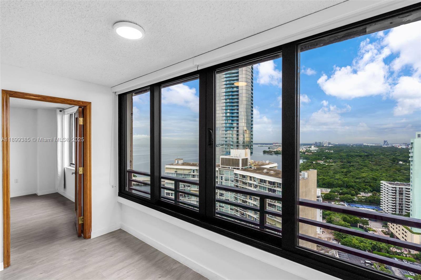 Attention Investors Unit is rented for $3500 until March 2027. Located in Miami’s Highly Sought-After Waterfront Neighborhood of Brickell, This 1 Bedroom + Den,  2 Full Bathroom Residence Features an Enclosed Balcony Expanding the Living Space to an Impressive 1,037 SF. Enjoy New Impact Glass Windows Showcasing Direct Biscayne Bay Views and Mesmerizing Sunsets.The Spacious Primary Bedroom Offers a Custom-Built Walk-In Closet. Nestled Within a Private Gated Community w/ 24-Hour Security, Lobby Attendant, and Valet Parking. Residents Experience True Resort-Style Living. Amenities Include: Heated Lap Pool, Kayak Water Access & Storage. 5 Tennis/Pickle Ball Courts, Fitness Center w/ His & Hers Steam and Sauna Rooms, Bayfront BBQ area, a Pet Park, Coffee Shop/Mini Market, Kids’ Playroom, Beauty Salon, Game Room & more. Covered Assigned Parking.