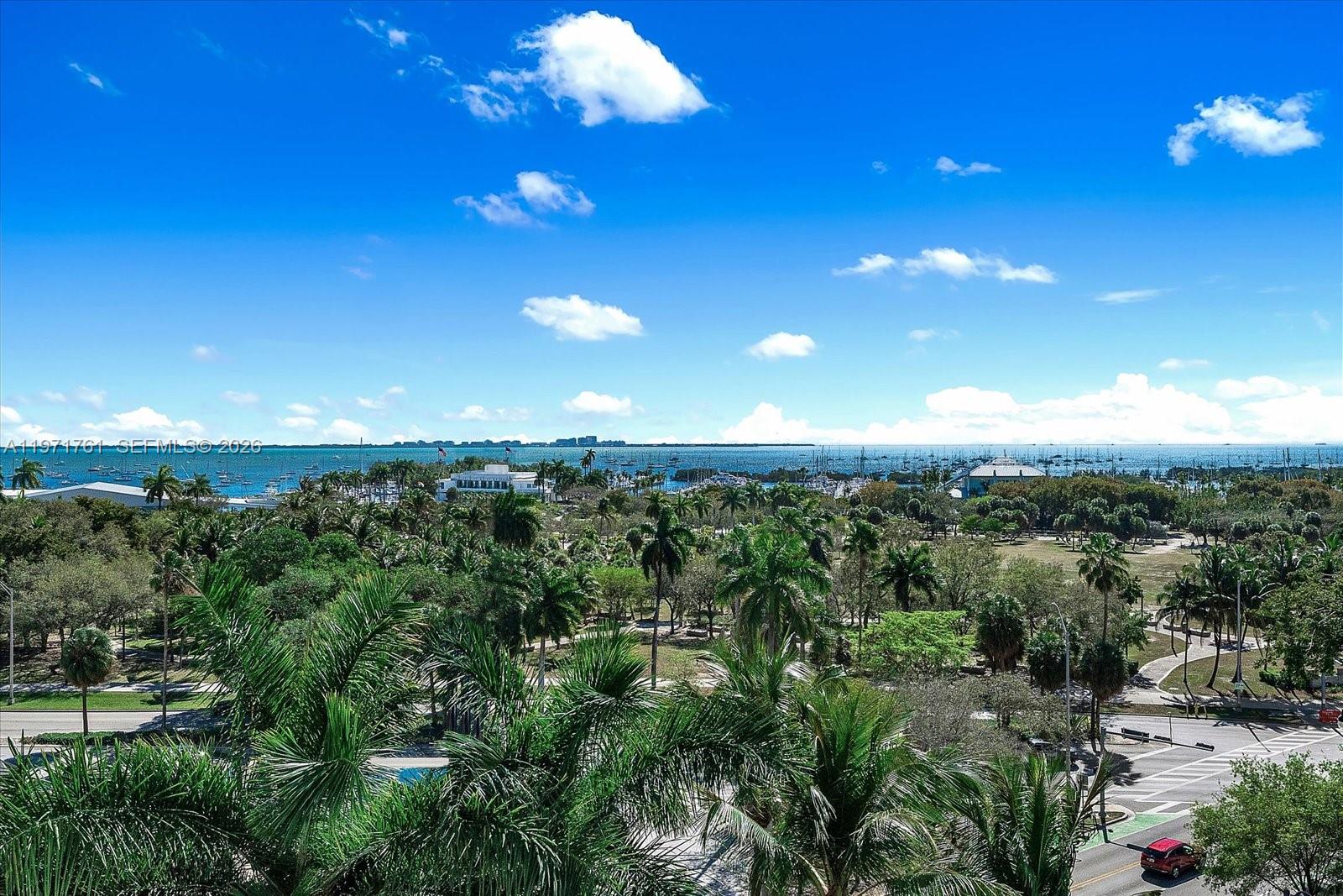 This exceptional and highly sought after 02-line condo at The Ritz-Carlton Residences features breathtaking, unobstructed bay and ocean endless water views. This expansive, fully renovated home features 2 en-suite bedrooms plus a powder room and den with Italian porcelain flooring, custom cabinetry, quartz countertops, generous closet space and new high-impact windows and doors, all designed for elegance and comfort. This residence offers generous living spaces and refined finishes at every turn. Enjoy private balconies and the world-class Ritz-Carlton experience with resort-style amenities, complimentary valet and walkability to Coconut Grove’s premier dining, shops, parks, schools and marina and a short drive to Coral Gables, Brickell, Miami Beach and the Miami International Airport.