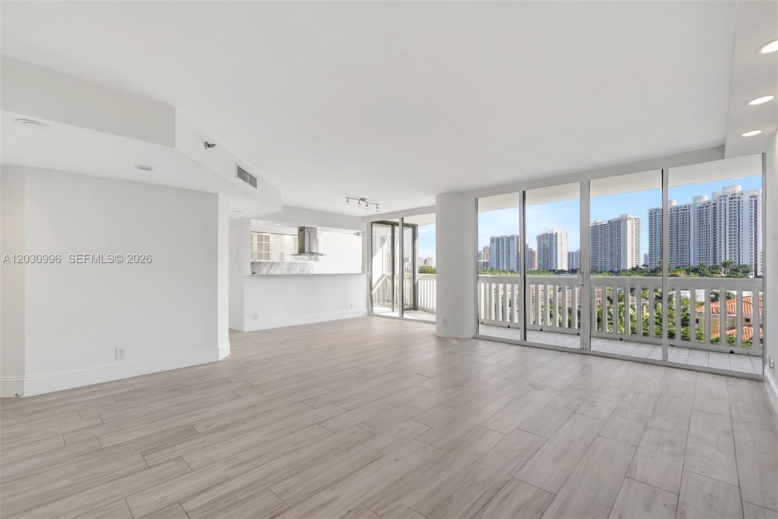 FULLY RENOVATED 3 BEDROOM/ 2.5 BATH UNIT THAT FLOWS THROUGH THE BUILDING. OPEN KITCHEN WITH LARGE COOKING ISLAND. CUSTOM CLOSETS. SEPARATE LAUNDRY ROOM. EXCLUSIVE POWDER ROOM BATH, BALCONIES FACING BOTH SIDES WITH VIEWS TO THE CITY AND MAULE LAKE AND ISLAND MARINA VIEWS.. LIVE IN PRESTIGIOUS WILLIAMS ISLAND WITH FULL AMENITIES: 15 TENNIS COURTS, 4 PICKLEBALL COURTS, 3 RESTAURANTS, STATE OF THE ART SPA, MARINA, WALK/JOG PATH, KIDS PLAYGROUND, COURTESY BUS, WALK TO HOUSES OF WORSHIP AND SO MUCH MORE....