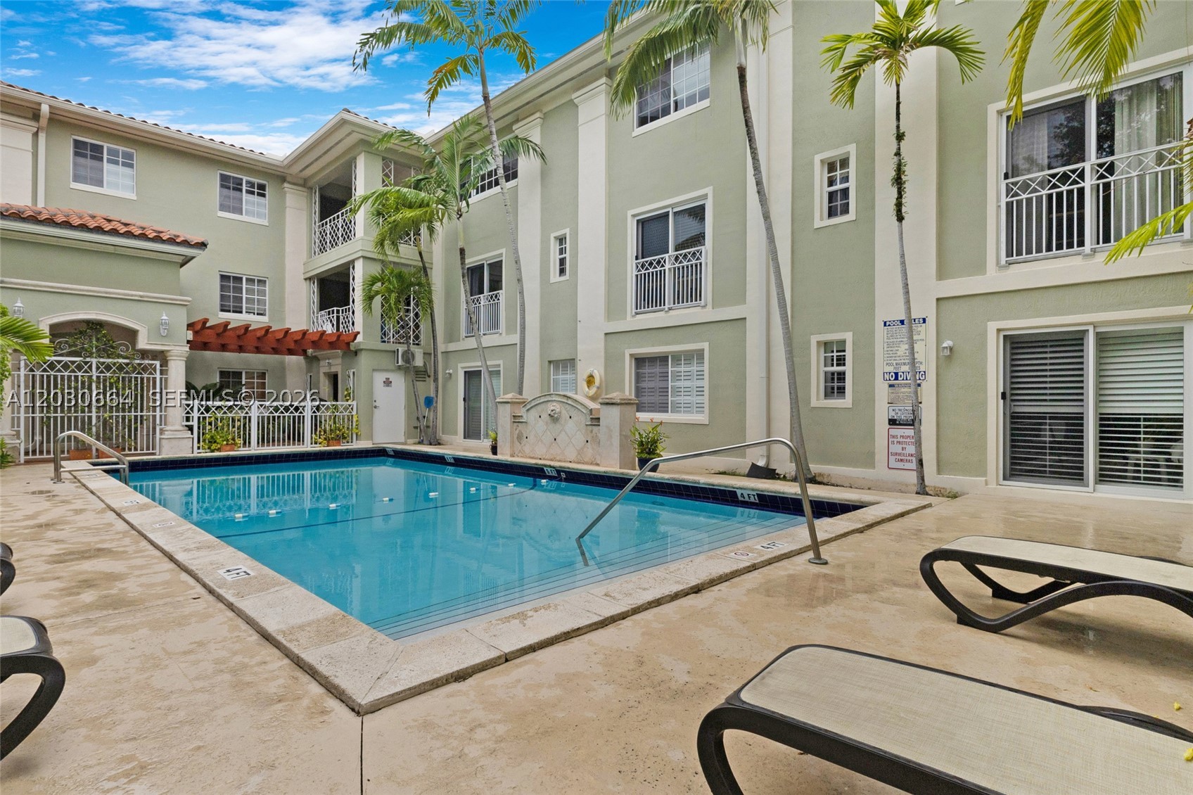 Welcome home to the City Beautiful! This well-maintained 2-bedroom, 1-bath residence is located in a charming garden-style community in Coral Gables. Move-in ready and exceptionally clean, the unit features central A/C, an in-unit washer and dryer, dishwasher, excellent closet space, and a bright, inviting layout.  A unique architectural corner window detail in the living area allows for abundant natural light and adds character to the space. The building offers elevator access and is situated within a gated community with controlled entry for added convenience and peace of mind.  Residents enjoy an assigned parking space, a beautifully maintained swimming pool, and lush community grounds. Ideally located within walking distance to Downtown Coral Gables, where you’ll find dining, shopping, entertainment, and the Coral Gables Trolley for easy transportation throughout the area.  Available for immediate occupancy.