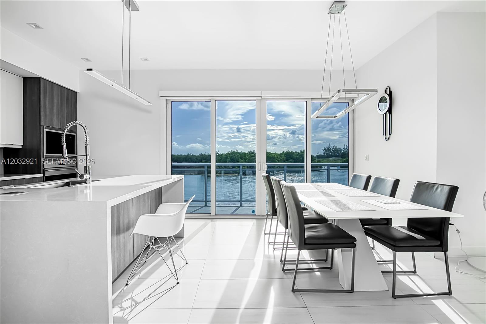 Welcome to the lifestyle you’ve always dreamed of in this boutique building along the Intracoastal Waterway with stunning views of boats and water! Enter through your private entrance to find floor-to-ceiling windows in every room, bathing your home in natural sunlight. This luxurious unit features 3 spacious bedrooms and 3.5 bathrooms. The expansive living room, which can be converted back to a third bedroom if desired, boasts high-end finishes. Enjoy a chef’s kitchen with custom white gloss and gray shaker cabinets, quartz countertops, and stainless-steel appliances. Oversized white tiles add sophistication throughout. Relax on your balconies, stroll to the pool, or watch boats drift by. Dock space for a 55 ft vessel is available. Don’t just dream it – see it, love it, and make it yours!