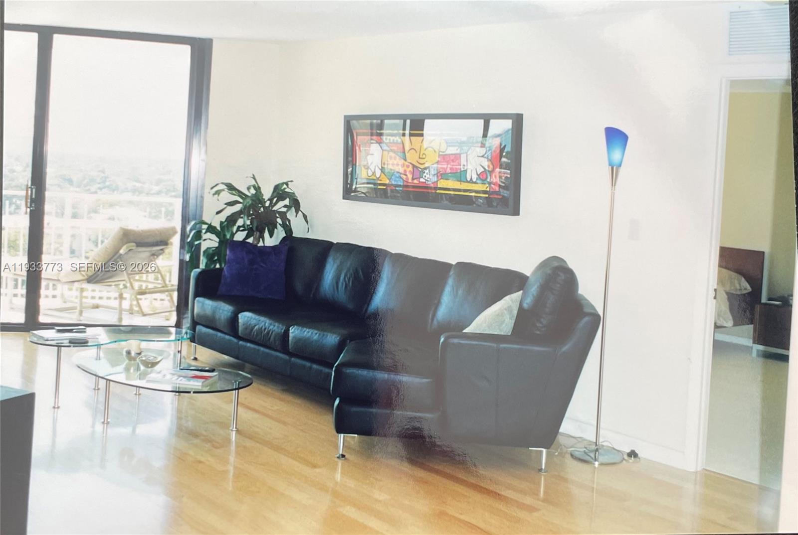 This Large spacious stunning split 2 bedroom 2 bath condominium unit offers breathtaking panoramic water and city skyline views from sunrise to sunset offering plenty of natural light.   This bright spacious unit offers maple wood floors, stainless steel appliances, marble bathroom and shower. Located in a secure, guard-gated gated community offering lush landscaping, residents enjoy the many luxury amenities like a spa, full gym, racquetball courts clay tennis courts, pickleball courts basketball court, playgrounds for kids, dog park, game-room, Club-room and on-site restaurants, a marina with docks, and guard-gated community 24-hour security ensure convenience and peace of mind. Relax by the pool, unwind in the jacuzzi or sauna, and host gatherings at the BBQ gazebo. The Unit has Two Assigned covered parking spaces and valet service, plus a free shuttle bus. This tropical oasis has everything you need for a serene and active lifestyle. This is a must see property.