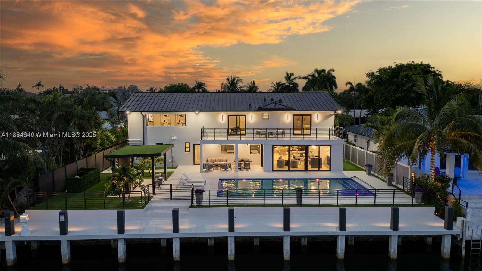 Live the ultimate waterfront lifestyle in this fully reimagined modern coastal retreat in exclusive Bermuda Riviera—Fort Lauderdale’s best-kept secret. Over $2M in upgrades blend timeless elegance with effortless luxury. Contemporary light-filled spaces flow to an outdoor paradise with a heated saltwater pool, sun shelf, pergola, and summer kitchen. Dock your yacht on 80 feet of deepwater with direct ocean access. With 5 bedrooms, 4 baths, and every detail brand new—from roof to dock—this is where sophistication meets the sea. This open-concept floor plan is PERFECT FOR ENTERTAINING. Features include Monogram luxury appliances, oversized kitchen island and custom cabinetry throughout. New plumbing, electrical, A/C, and hot water heater—just bring your boat and toothbrush!