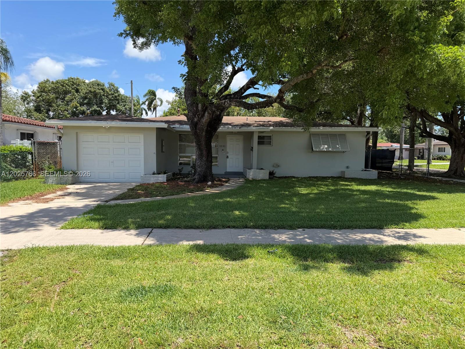 Discover this beautifully updated 1,708 SF, 2-bed, 2-bath single-story gem in Hollywood's Park East neighborhood. The open floorplan features striking tile flooring and a stunning kitchen with granite countertops, premium cabinetry, and stainless steel appliances. Outside, enjoy a spacious fenced backyard with an inviting patio—perfect for relaxing or entertaining. Located near beautiful parks and sunny beaches. Schedule your tour today!