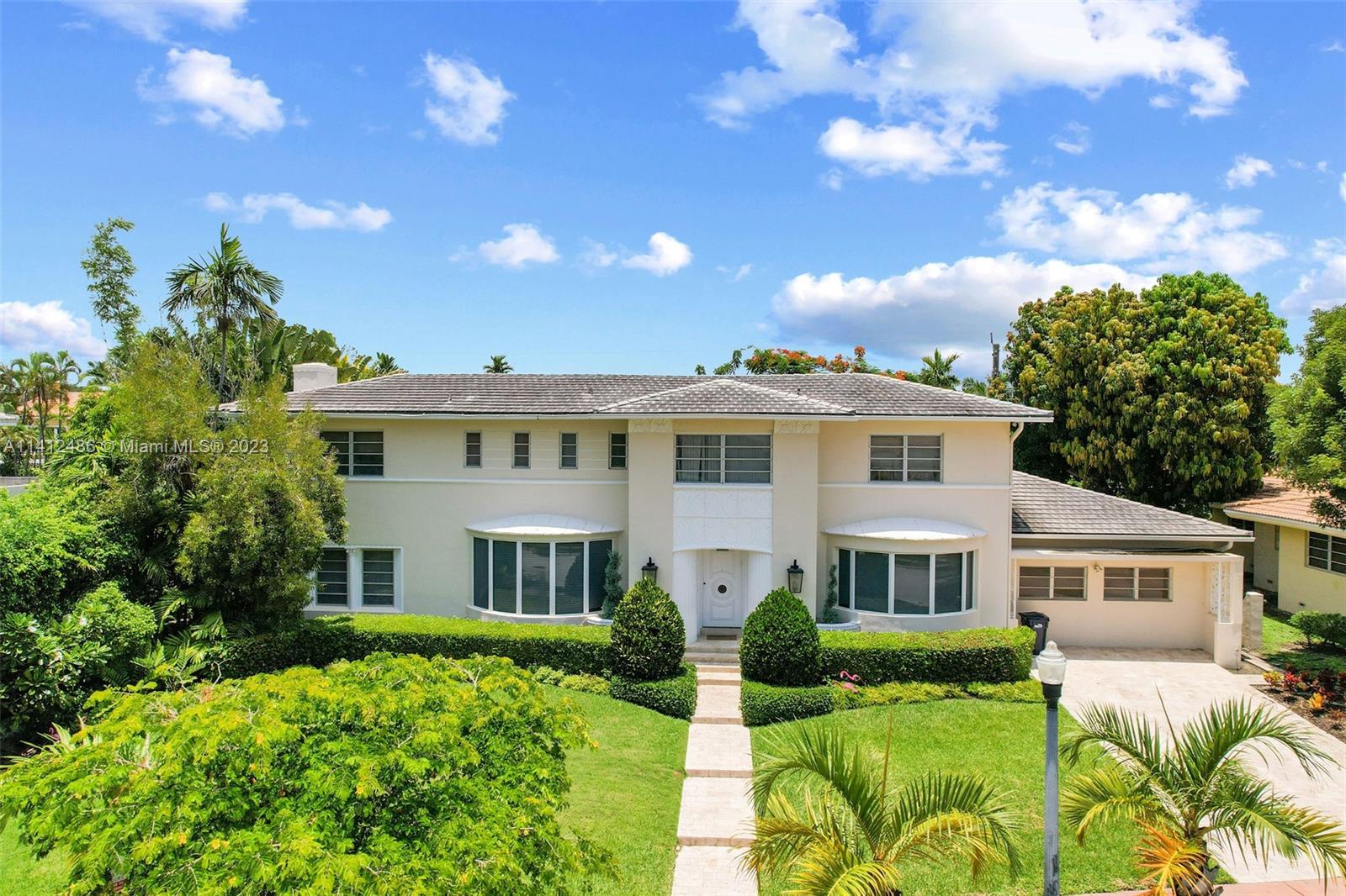 First time on the market in over 40 years, introducing 2908 Flamingo Drive. Enter through the grand foyer entrance where the home is sectioned off proportionately to host any type of occasion. From formal dinners, to game night in the family room to the formal living room with built in wet bar to entertain your guests. All bedrooms are spacious and have ensuite including nanny's corridor. The spacious lot sitting slightly above 11,000 sqft, has room to add a pool and additional sqft to the already expansive home. Huge opportunity to own a piece of Miami Beach's prime real estate and create the home of your dreams. This home is located in a quiet street with a pedestrian bridge connecting you to the sandy Miami Beach. Minutes away from the city's best dining, shopping, & leisure activities.