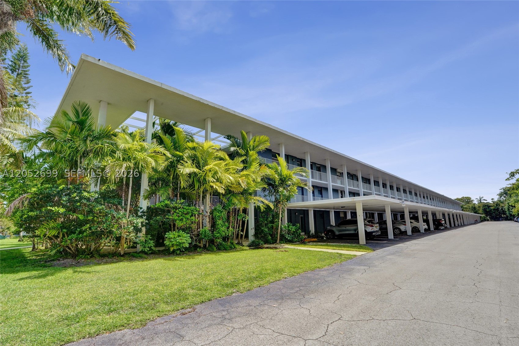 Great opportunity in East Deerfield Beach! This first-floor, lake-view condo features an assigned covered parking space right outside your door and super low maintenance fees. Freshly painted with tile flooring throughout. The community has already completed its 40- and 50-year inspections, and all assessments have been paid. This well-managed property offers a beautiful backyard wildlife sanctuary with a walking trail around the lake and a heated island pool. All ages are welcome, and rentals are permitted immediately after purchase. Priced to sell—don't miss this opportunity!