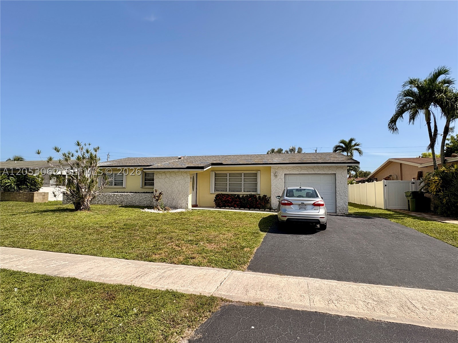 Located in the highly sought-after Pembroke Lakes community, this rarely available Tamarind model offers an exceptional opportunity to create the home you've always envisioned. Situated within a highly rated school district, this home features a flexible floor plan with the potential to convert a portion of the spacious family room into a third bedroom, adding even more value and functionality.

Enjoy Florida living from the covered, screened patio overlooking a generous backyard with plenty of room for a custom pool, outdoor kitchen, or garden. Additional highlights include a one-car garage with an expanded driveway, accordion shutters for added storm protection, A/C (2014), and a brand-new water heater (2025).

Whether you're a first-time buyer, investor, or someone looking to personalize a home to your own style, this property is a true blank canvas with incredible potential. Opportunities like this in Pembroke Lakes are rare—bring your vision and make it your own!