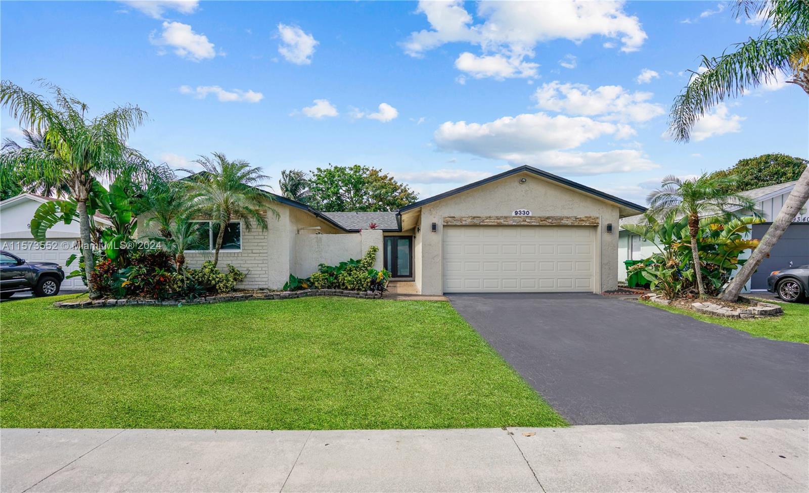 Discover comfort and convenience in this 4-bed, 2-bath home on a serene cul-de-sac in Welleby, West Sunrise. Its spacious layout and open concept design offer a newly designed kitchen with SS appliances, stunning backsplash, quartz countertops, and a waterfall island that enhance the space, perfect for meals in the eat-in kitchen. Relax in the cozy living area or retreat to the private fenced-in backyard. The luxury of a 2-car garage, new roof (2023), and complete impact windows and doors add value to this stunning home. With prime proximity to schools, parks, and shopping, this home has it all.