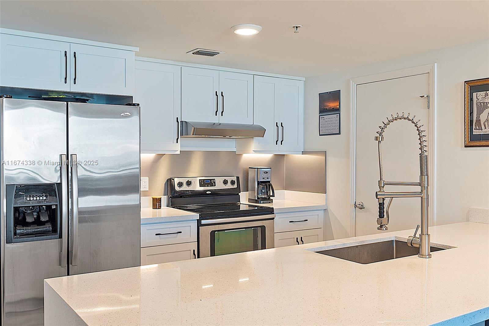This substantially remodeled spacious 2 bedroom 2 bathroom plus large den or 3rd bedroom offers beautiful update open kitchen with waterfall island, lots of cabinet space overlooking large living area leading you to stunning, unobstructed city views. Wood floors throughout unit. Spacious laundry room with large stackable washer/dryer. Building offers, 2 pools, 2 gyms, club room, saunas, 24 hour concierge, valet and security Walk to Dadeland Mall, Publix, Trader Joes, Metro Station and all up and coming restaurants.