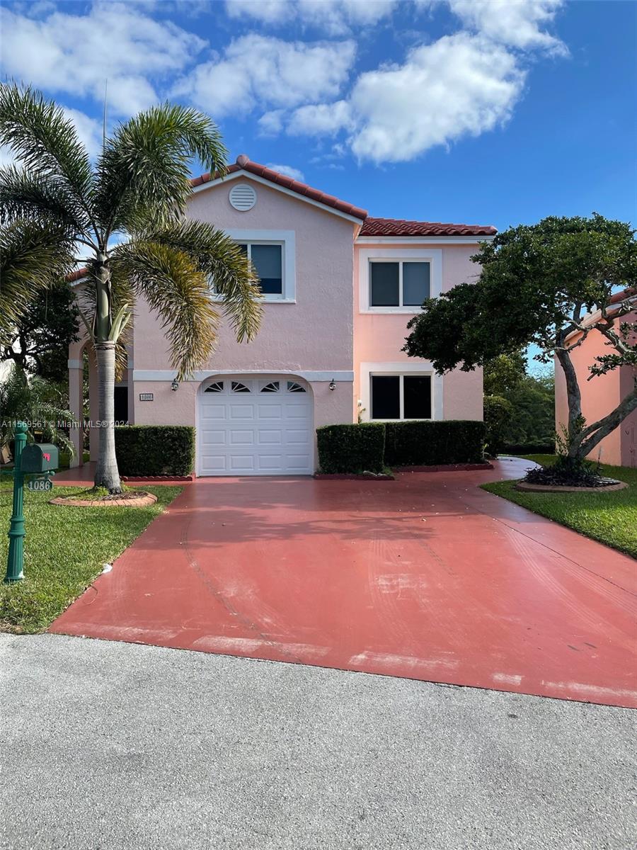 Beautiful, two-story, lakefront, property located in Dania Beach! Located in a gated community, this 3 bedroom
and 3 bathroom (with a den that can be used as an additional bedroom) lakefront home comes complete with an
attached garage and covered back porch overlooking the lake. Less than 5 minutes from West Lake Park! Near
shops and minutes away from the beach! This property offers a rare opportunity to experience waterfront living at
its finest! Don't miss your chance to live in this exceptional home and make your waterfront dreams a reality.