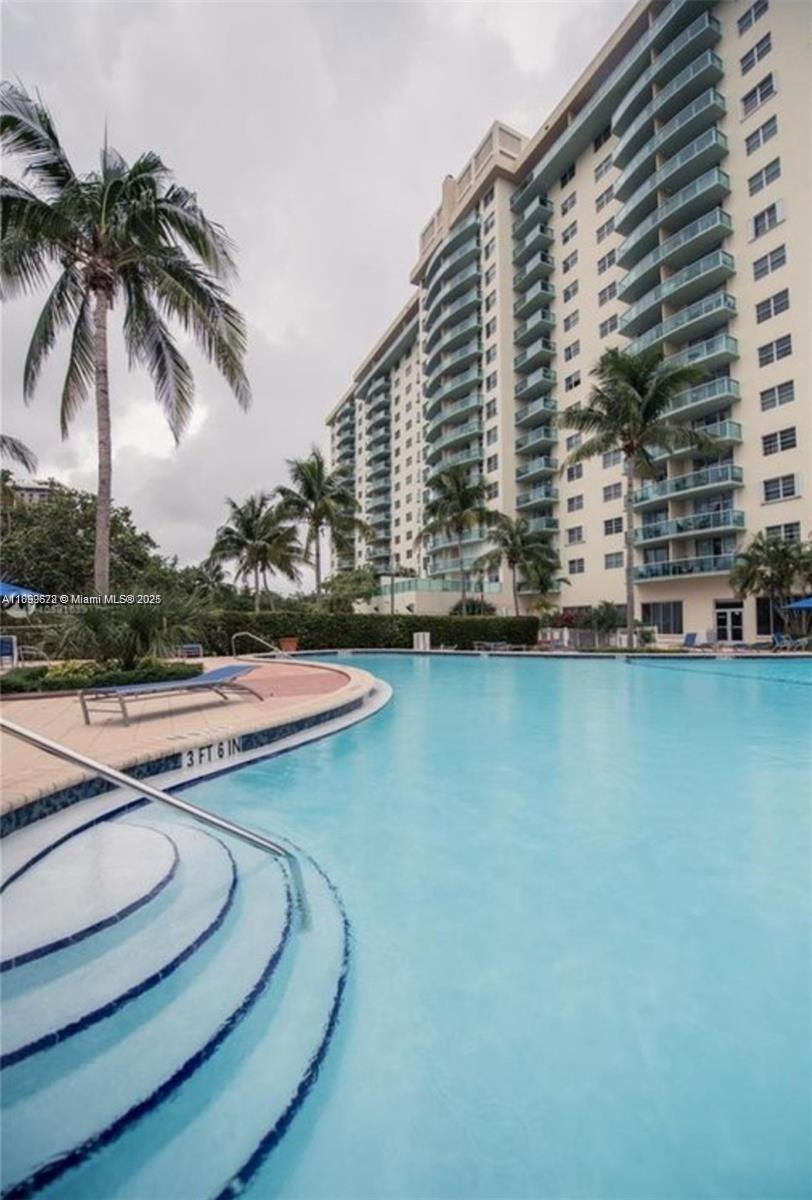 Turn key unit! Spacious and Large 1/1 apartment 1005 sq. ft. This fully remodeled unit offers modern finishes, ample living space, tile floors, a beautiful open kitchen, and a spa-like bathroom Oceanview Complex located just steps from the beach, the building features amenities including a pool, gym, tennis court, and additional recreational facilities, like free internet, an upgraded cable package, and water. Investors or homeowners are welcome. The condo allows 6 months of rental (twice a year). The condo is almost done with a renovation project of the lobby and hallways. No special assessments are pending. Condo has reserves it is ideal for those seeking a luxurious coastal lifestyle with convenient access to top-notch amenities.