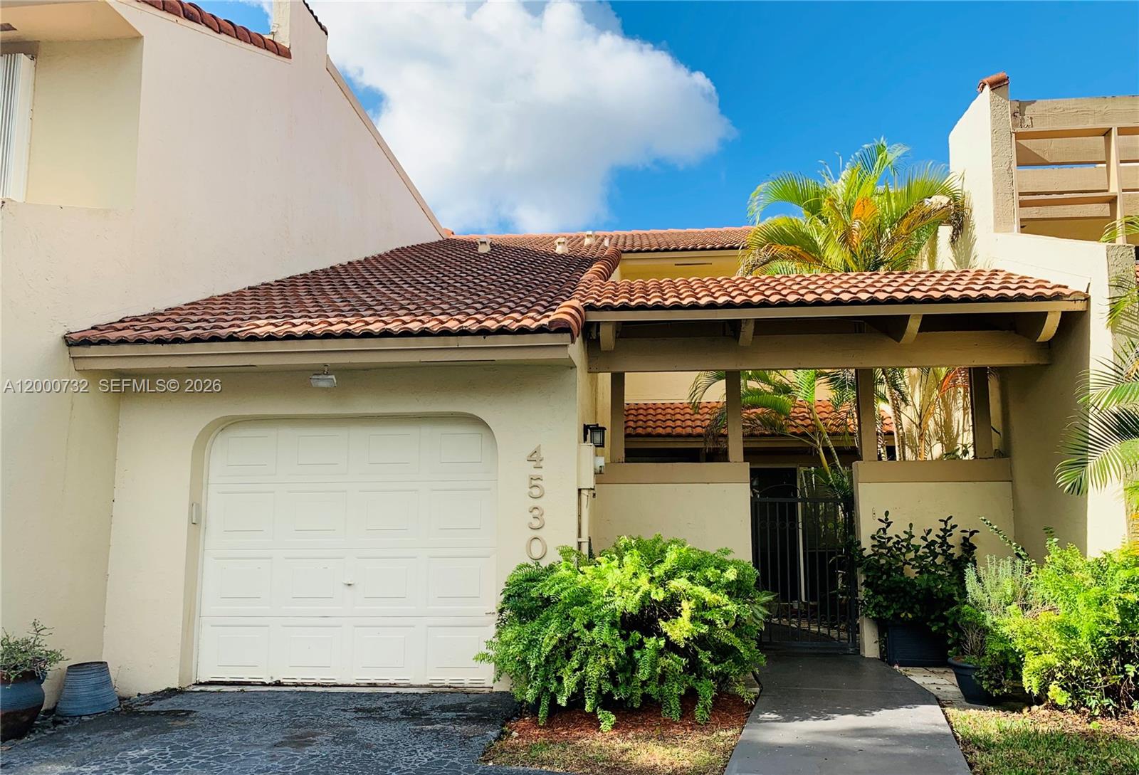 Beautiful townhome located in the highly desired Doral Park area. This 2-bedroom, 2.5-bath residence features an additional room in the garage, perfect for office or storage use. Doral Place is the only community with private and direct walking access to Doral Park Country Club, where residents enjoy resort-style amenities including pools, fitness center, tennis courts, restaurant, and more. Gated community conveniently located near shopping, dining, schools, and major highways.