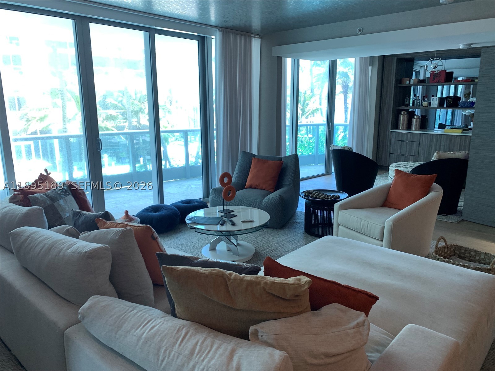 SPECTACULAR BEACHVIEW IN AZURE CONDO... This fabulously decorated 2 Bd/2 Bath was made into a large 1 bed/den open floorplan with chic Japanese wood sliding doors. This stunning layout offers a unique contemporary design offers a fresh point of view. Upon entry a lovely foyer awaits. Followed by the den then a sleek kitchen with Miele & Subzero appliances with stone counter-tops, bright living & dining area. The exquisite master suite is equipped with massage showers and a large spa tub which are state-of-the-art. Take in the sea breeze on the oversized balcony. At Azure Condo residents can enjoy world class amenities including spa, sauna, massage & treatment rooms, heated pool, fitness center & beach service! At walking distance from Surfside shops, Bal Harbour shops, restaurants & more!