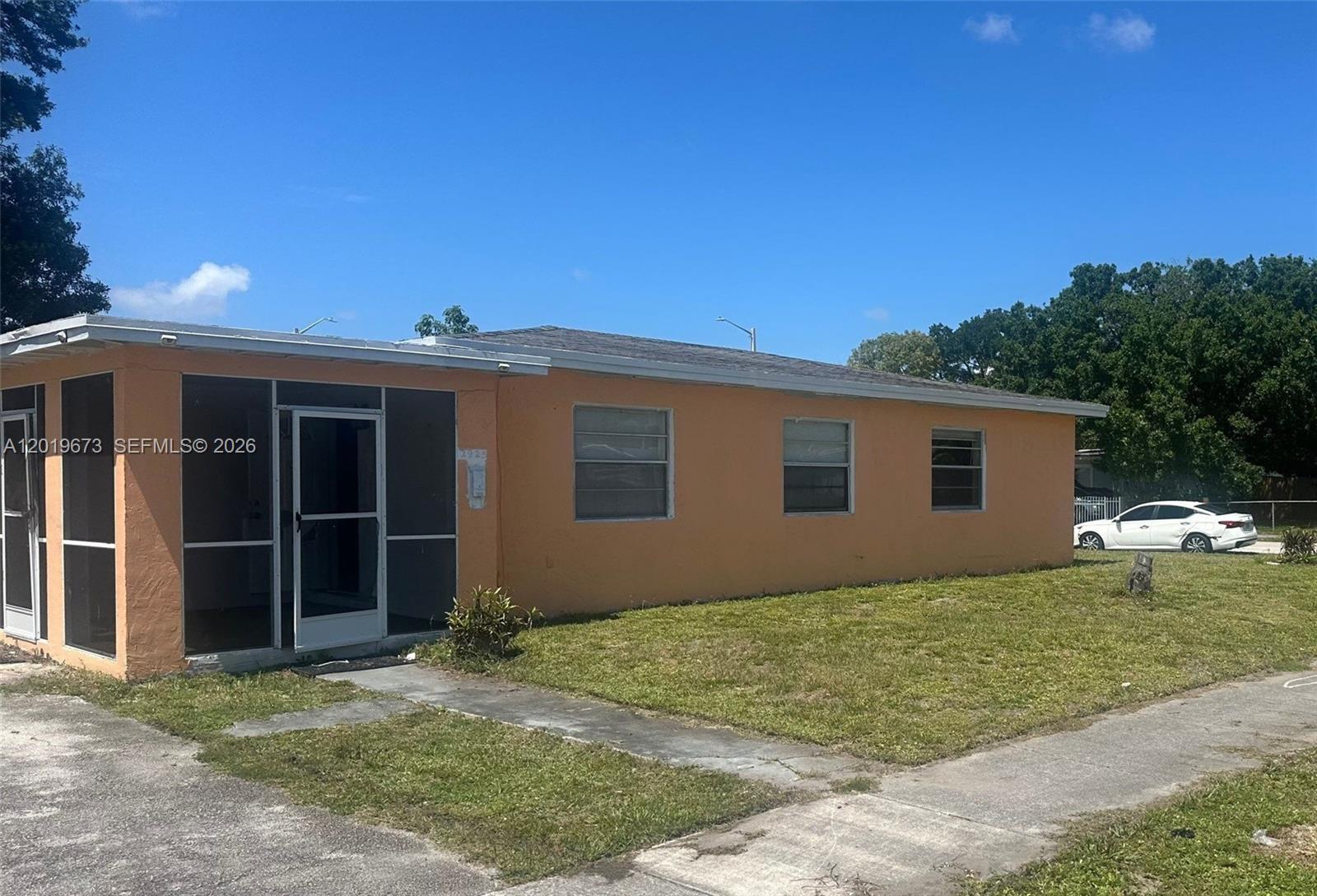 Great opportunity to bring your vision to life with this 3 bedroom, 1 bathroom situated on a spacious corner lot near downtown Fort Lauderdale. This home features a living and dining room combination, tile flooring throughout, spacious bedrooms, and a large kitchen with plenty of potential. Enjoy relaxing on the screened front lanai overlooking the oversized yard with room to expand, garden, or entertain. Conveniently located close to major roadways, parks, shopping, dining, entertainment, and the beautiful South Florida beaches. Ideal opportunity for investors, renovators, or buyers looking to customize a home in a prime location. All information recorded in the MLS is intended to be accurate but cannot be guaranteed, buyer advised to verify. Sold As-Is