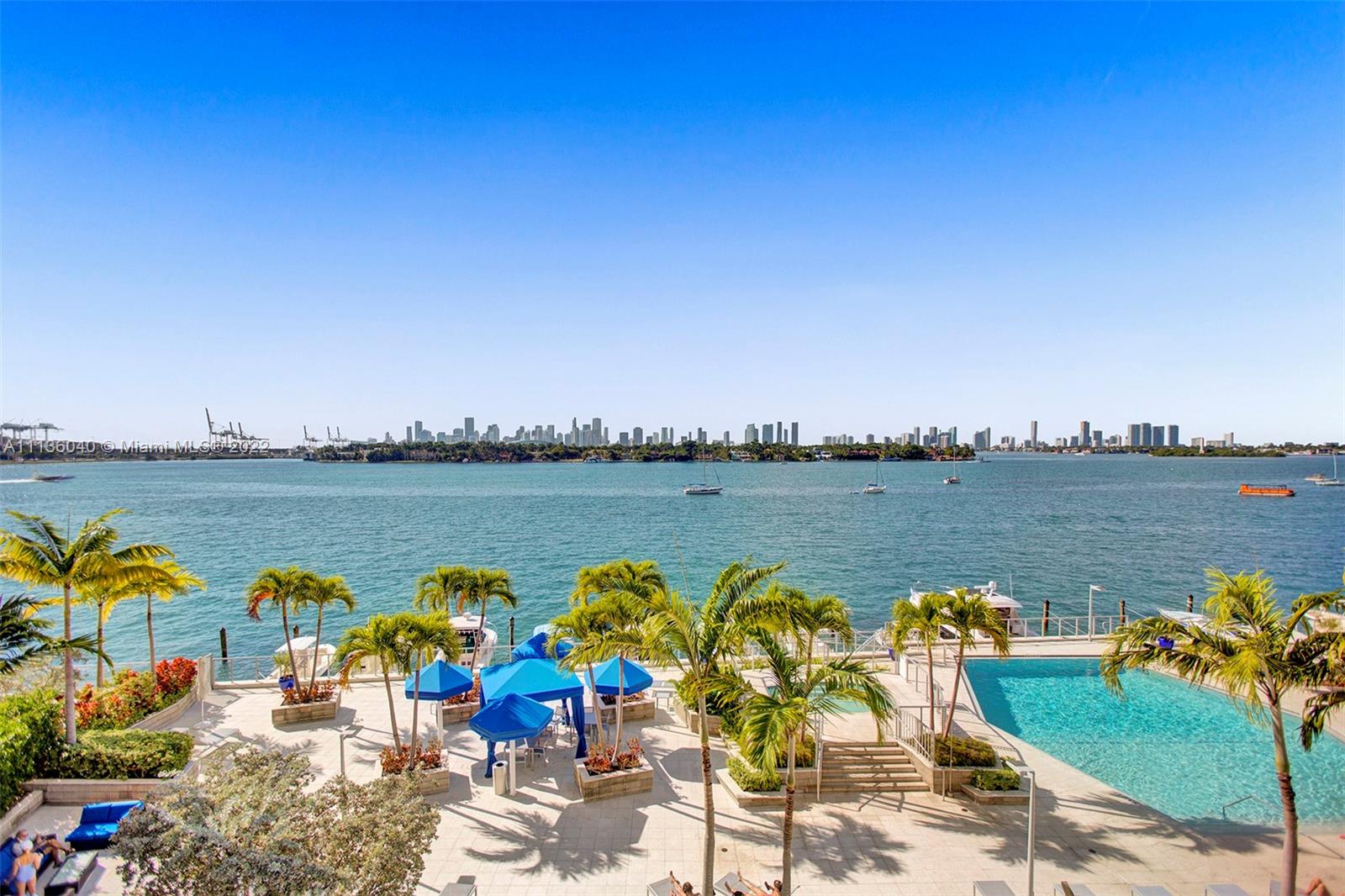Breathtaking views day & night are the focal point of this unit. With floor-to-ceiling glass doors in the living room, you will be mesmerized while overlooking Biscayne Bay, Star Island, the cruise ships & the downtown skyline. Spacious floor plan with a balcony. South Bay Club offers Resort-style amenities include a beautiful open-air lobby, a bay front pool deck, 24-hour concierge, and gym. Prime location in the heart of South Beach within walking distance to the beach, Lincoln Road, shopping, and world class dining. Easy access to the highways. Assigned, covered garage parking included. A dog up to 26 pounds is ok. Rentals (2 times per year) are allowed.