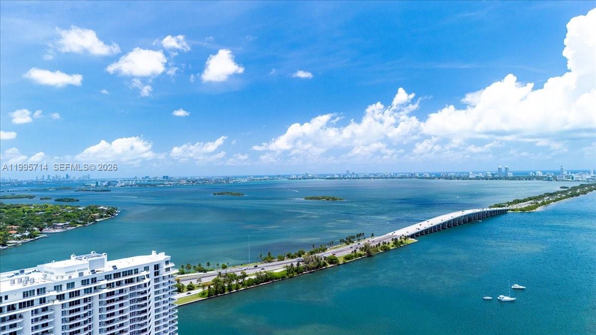 LUXURY 3 Beds, 2 Baths, ASTONISHING BAYFRONT VIEW MIAMI. Reside in this stunning high-end furnished corner unit consisting of 3 bedrooms and 2 bathrooms equipped with voice command electric blinds and an electric sofa. Enjoy a wraparound balcony with breathtaking views of the bay, city, and ocean. Bosch appliances, ceramic and wood floors, 360 degree rooftop pool on 46th floor and another pool on the 5th floor. Party room, state of the art fitness center, kids room, tennis court, BBQ area, business center, game room, sauna, wine room, cigar lounge, movie theater. Building is minutes away from the Miami Design District, Wynwood, Midtown, Miami Beach, and downtown. Come and see for your self today !