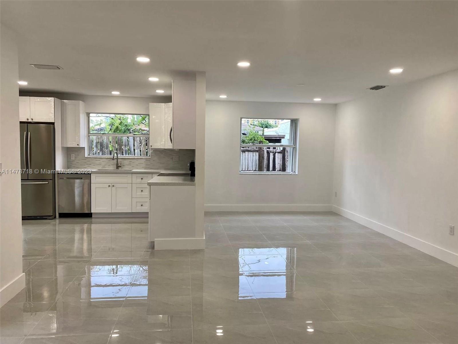 Remodeled home in the popular Silver Bluff section of Miami's Coconut Grove with covered parking, large patio, and featuring 3 Bedrooms and 2 Bathrooms.  Spacious, modern interior, brand-new kitchen and bathrooms, new floors, new AC, gated entrance to the front door, and an abundance of parking.  Ideal location situated just minutes to Coral Gables, Brickell, and a short ride to Miami International Airport, and Miami Beach.