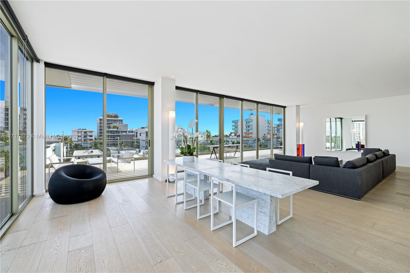 Indulge in the epitome of luxury at the exclusive 300 Collins boutique condominium.Designer Thomas Juul-Hansen created a floor plan that provides the feel of a single-family home.A private dual-opening elevator unveils 2 distinct entrances— one leading into the living area with 10’ high ceilings and alternatively,the rear elevator opening allows guests/staff to access the kitchen & secondary bedrooms.The chef's kitchen offers Miele appliances & a gas cooktop. The primary suite unfolds to the wrap-around terrace that envelops the entire apt, while its spa-like bathroom serves as a serene retreat.The residence embraces the allure of minimalistic design, where every detail has been meticulously curated to foster a serene ambiance.Amenities include 24/7 concierge services,gym & a rooftop pool.
