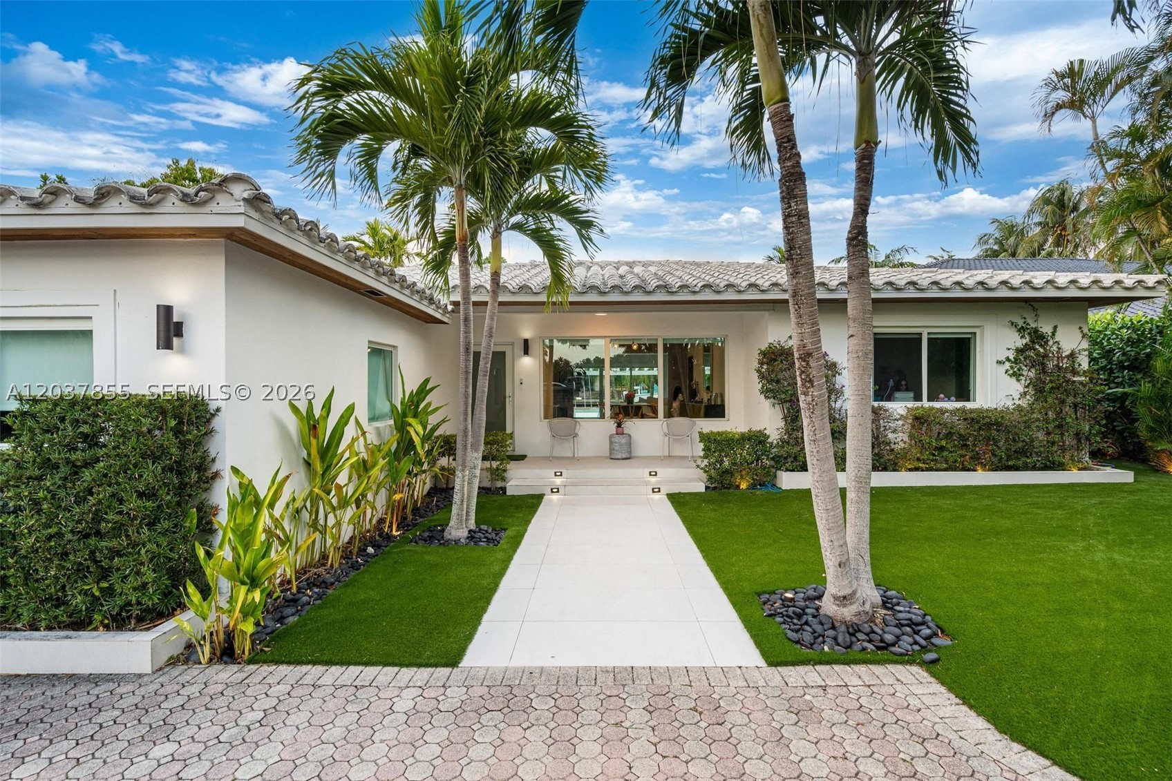 Nestled within the prestigious guard-gated community of Biscayne Point, this beautifully maintained residence offers the perfect blend of comfort, privacy, and Miami Beach living. Featuring 4 bedrooms and 3 bathrooms, the home boasts a bright open layout designed for both everyday living and effortless entertaining.
Expansive living spaces flow seamlessly to a tranquil waterfront setting, where a private dock and serene canal views create the ultimate backdrop for relaxation. 
Situated on a generous 9,000 SF lot, this property offers exceptional outdoor space and endless potential. Ideally located just minutes from the beach, Bal Harbour Shops, fine dining, and top schools, this is a rare opportunity to enjoy waterfront living in one of Miami Beach’s most sought-after gated neighborhoods.