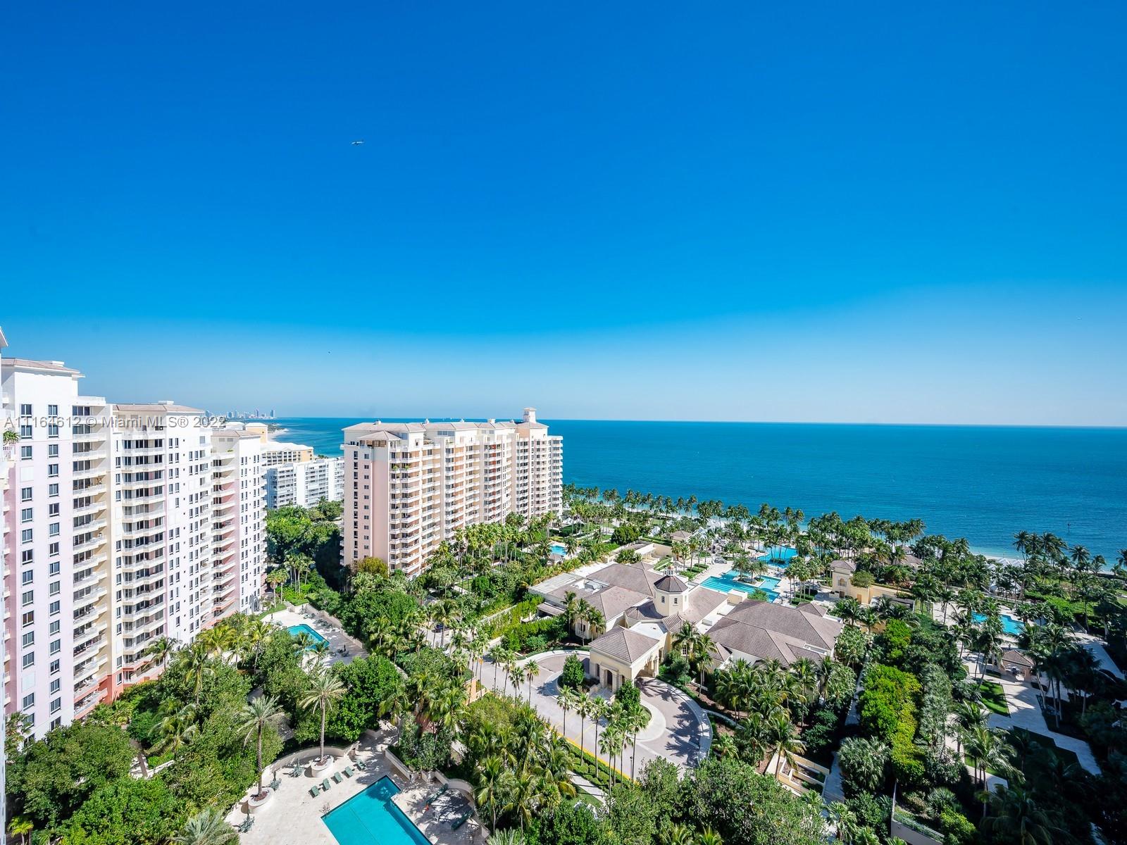 The very best of Key Biscayne! This two-level Penthouse offers beachfront luxury & the most spectacular views across Miami. A private elevator opens to a grand double-height entrance. The Owners delight in cooking while the sunsets over the bay from their dream ‘chef’s kitchen’. It’s a brand-new remodel throughout w/impeccable taste in décor & finishes. A glass staircase leads to a second Family Room, private office & two rooftop terraces perfect for entertaining! The Jacuzzi offers a perfect way to unwind! There is 3,100 SF under AC including the 2nd floor enclosure. 3 parking spaces are premium located on upper level. The Ocean Club offers resort-style family living with a private & newly remodeled Beach Club, poolside restaurants, fitness center, spa & beauty salon, Tennis club & more!
