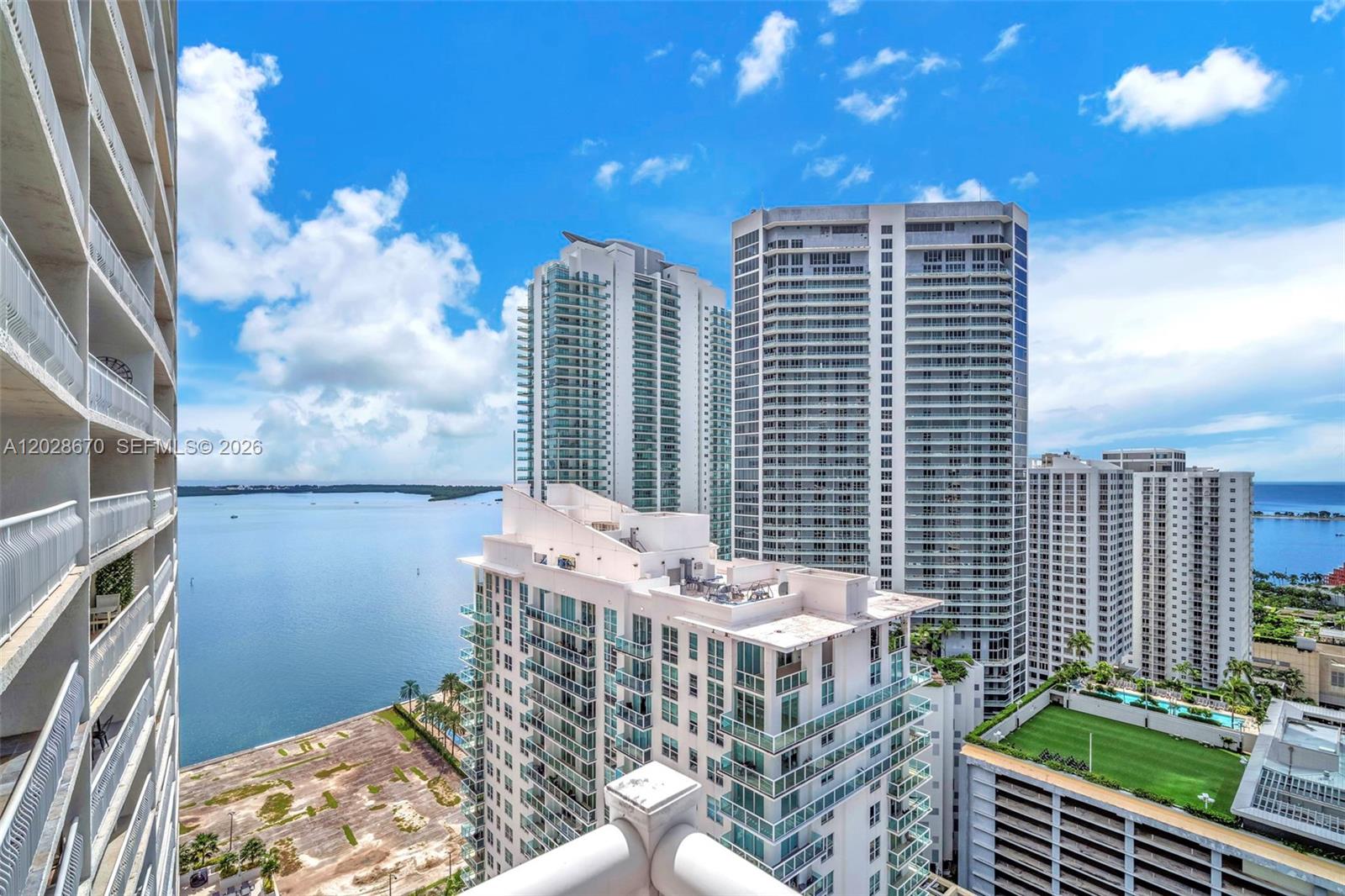 Spectacular 31st floor corner condo in the heart of Brickell with 2 bedrooms, 2 bathrooms plus a den. Daily rentals allowed making it ideal for investors or as a private residence. Wraparound balcony with striking city views and partial bay vistas. Features include travertine floors, renovated bathrooms, custom closets, stainless steel appliances, granite countertops, motorized window shades and a high end washer and dryer. One assigned parking space included. Building amenities offer a tropical pool deck overlooking the bay, two heated pools, oversized whirlpool, fitness center, kids play area, business center, party and game rooms with 24 hour security and valet. Daily Rentals Allowed.