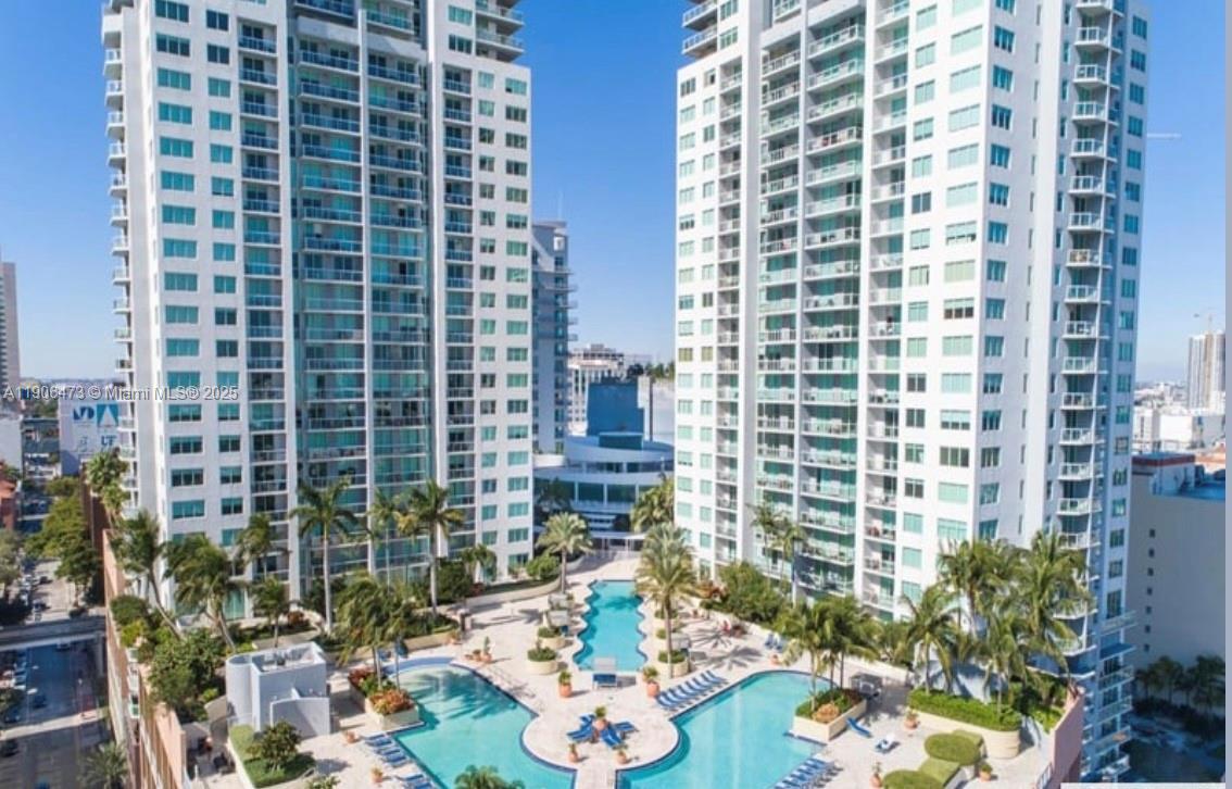 Beautiful updated 2-story loft 1/1.5 in the center of downtown area. Stunning views directly on Bayfront park and city skylights! Luxury building with 5-star amenities, outside pool, gym and spa in the building. Everything is walkable distance from that location: restaurants, bars, office buildings! Washer and dryer in the unit. Tenant occupied, can be shown with a notice. Owner motivated, price is negotiable!