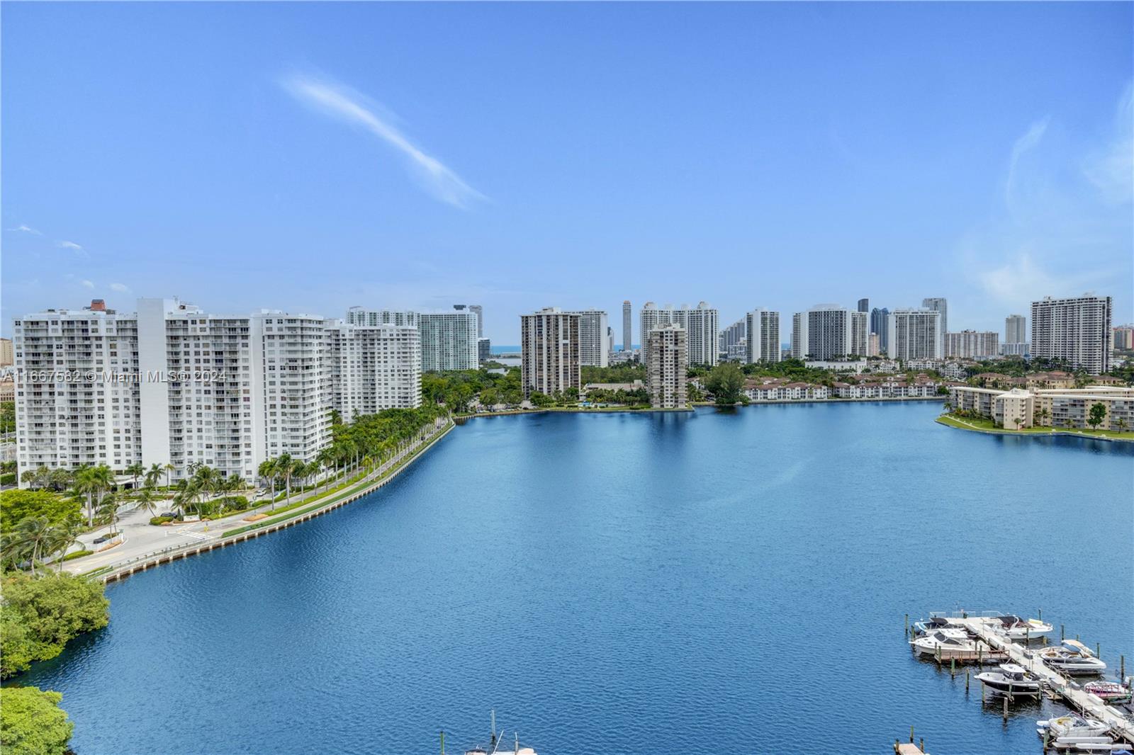 Welcome to your dream apartment in Aventura! This stunning 2-bedroom, 2-bathroom unit offers breathtaking water views that will captivate you from the moment you enter. The open-concept living area features comfortable, modern furnishings and large floor-to-ceiling windows that fill the space with natural light and panoramic water views. The gourmet kitchen boasts sleek appliances and elegant cabinetry, perfect for enjoying morning coffee. The spacious primary bedroom is a serene retreat with a luxurious en-suite bathroom, while the second bedroom is ideal for guests or as a home office, with convenient access to a stylish second bathroom. Relax on your private balcony and embrace the vibrant lifestyle of Aventura!