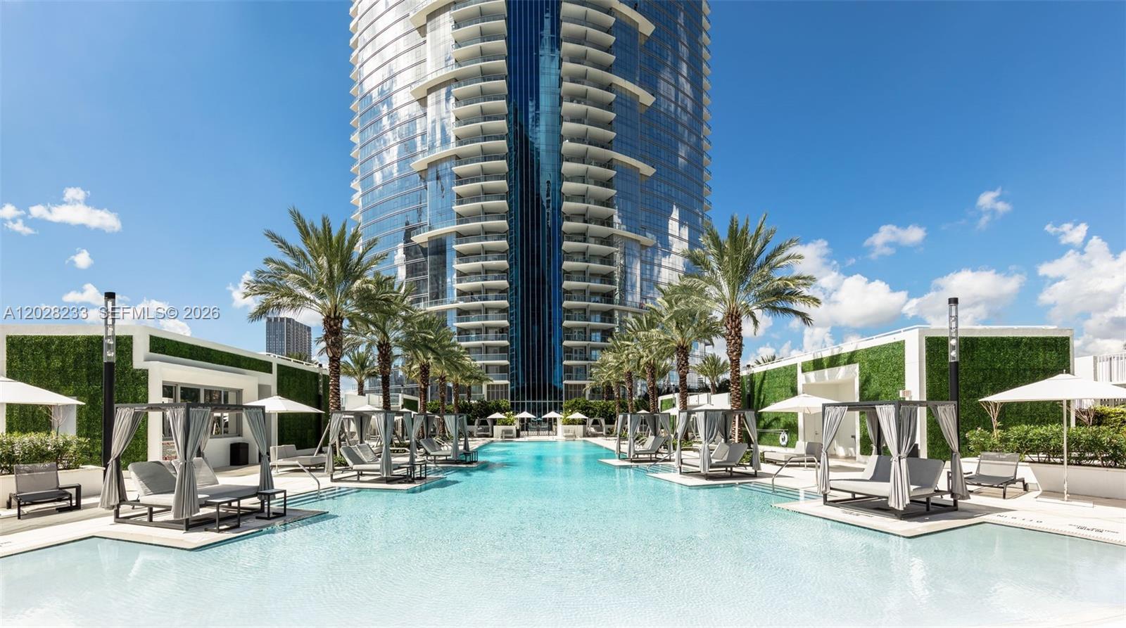 Stunning 3 Bedroom (Converted Den) 3 full baths Panoramic city and bay views, Italian cabinetry, Bosch and Subzero appliances. Paramount Miami Worldcenter offers five-star amenities including a six-acre amenity deck featuring resort-style pools, a state-of-the-art fitness center, signature spa, boxing studio, basketball half-court, racquetball court, business center, game room, golf simulator, jam room with a recording studio, soccer field, dog park, tennis courts, children’s playroom, and much, more. Paramount Miami WorldCenter also has separate amenities located on the rooftop level, such as a lounge, pools, sundeck, and observatory, Don't miss this opportunity this beautiful unit won't last Long. CONTACT LISTING AGENT FOR A PRIVATE SHOWING AVAILABLE 24/7 AT ANYTIME.