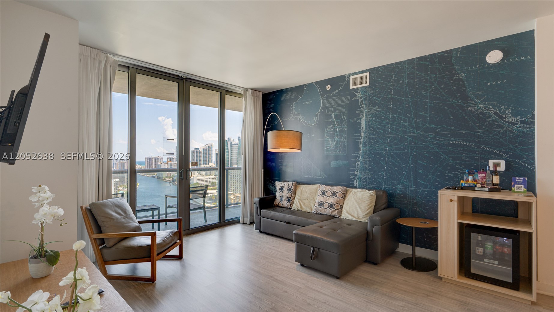 Exceptional Investment opportunity at Beach Walk Resort. This apartment is fully furnished, with 2 bedrooms, two bathrooms, living room and kitchen, two large balconies that offer a wonderful view of intracoastal canal and ocean. The unit has two access, allowing to rent it separately, maximizing the profit.
Unit A features a spacious one bedroom, one bathroom, kitchen and a large living room, while Unit B features one bedroom and one bathroom. A connecting door allows to connect  the Unit A and unit B for a large group. Daily rentals  are permitted, making this unit highly attractive for investors. Residents and guests enjoy the various amenities of the resort such as, valet parking, shuttle to the beach, gym, pool, a private infinity pool for residents. The maintenance includes electricity, water, internet cable.
This apartment is a perfect combination of vacation home, income - producing investment property.