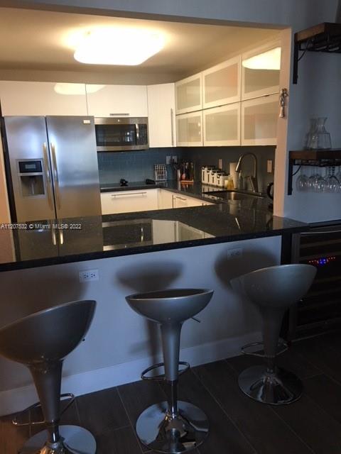 RONEY PALACE CONDO - Residential Lease