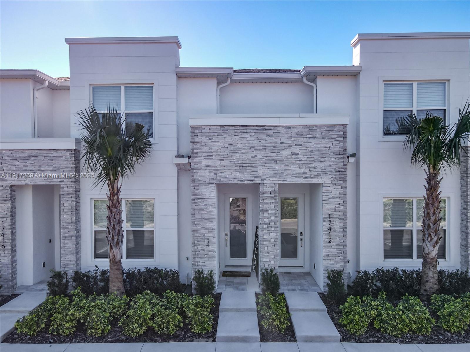 A 2025 modern, fully furnished, turnkey 3/3 + Loft townhome near Orlando's theme parks. Perfect for a primary residence or a lucrative short-term rental investment. Features include a private heated pool in a screened backyard, open-concept layouts, porcelain tile, modern cabinetry, and quartz countertops. Affordable HOA fees & coming soon, a resort-style clubhouse (pool, fitness center), and crucial, NO RENTAL RESTRICTIONS! Immediate income potential from Day 1!