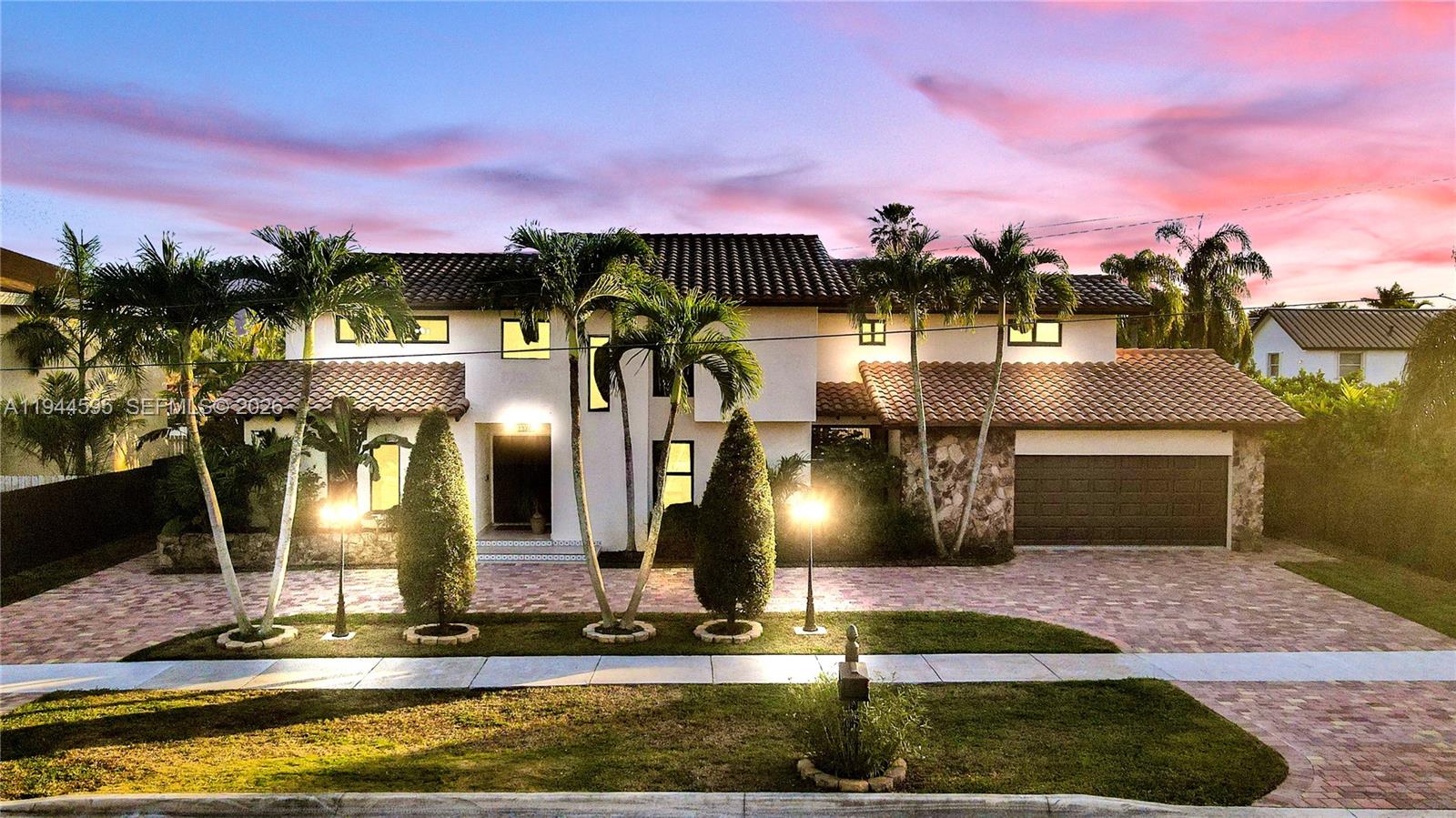 A RARE & TRUE TURN-KEY 6 BED/4 BATH RESIDENCE W/ IMPRESSIVE FEATURES & INCOME POTENTIAL UNSEEN IN THE AREA. Very few homes offer this level of size and design and NO OTHER HOME ON THE MARKET HAS SIX TRUE BEDROOMS with, not one, but THREE PRIMARY MASTER SUITES & ENSUITE BATHROOMS. The layout includes ONE PRIMARY ON MAIN LEVEL & TWO UPSTAIRS providing privacy & versatility. The main-level primary offers a PRIVATE DOUBLE-DOOR EXTERIOR ENTRANCE ideal for SEPARATE LIVING OR ADDITIONAL INCOME POTENTIAL. The living room & (2) downstairs bedrooms are highlighted by VAULTED TIMBER WOOD CEILINGS adding warmth, character, and architectural presence also rarely seen. Over $300,000 IN RENOVATIONS have been completed resulting in a space that is FUNCTIONALLY NEW. Updates include IMPACT WINDOWS AND DOORS, APPLIANCES, A DOUBLE-WIDE BRICK-PAVED EXTERIOR, & DESIGNER FINISHES throughout. The SPLIT FLOOR PLAN & EXTRA-WIDE LOT FOOTPRINT create an open, airy feel w/ beautiful curb appeal just 4 MINS FROM 836 HIGHWAY. Outdoor living features THREE BALCONIES, SECOND-FLOOR ACCESS VIA A SPIRAL STAIRCASE, and a 30x13 EXTRA-LONG, CONVERTED SALTWATER POOL. CITY-APPROVED ARCHITECTURAL PLANS FOR ADDED 2 BED/1 BATH GARAGE CONVERSION convey with the sale offering a path to FUTURE INCOME OR ADD’TL LIVING SPACE. TAXES also COMPARATIVELY LOW. Come & enjoy this refined blend of LUXURY, SCALE, AND FUNCTIONALITY that sets this home apart. SEE ATTACHED LIST FOR FULL FEATURES & UPDATES. EASY TO SHOW VIA SHOWINGTIME.