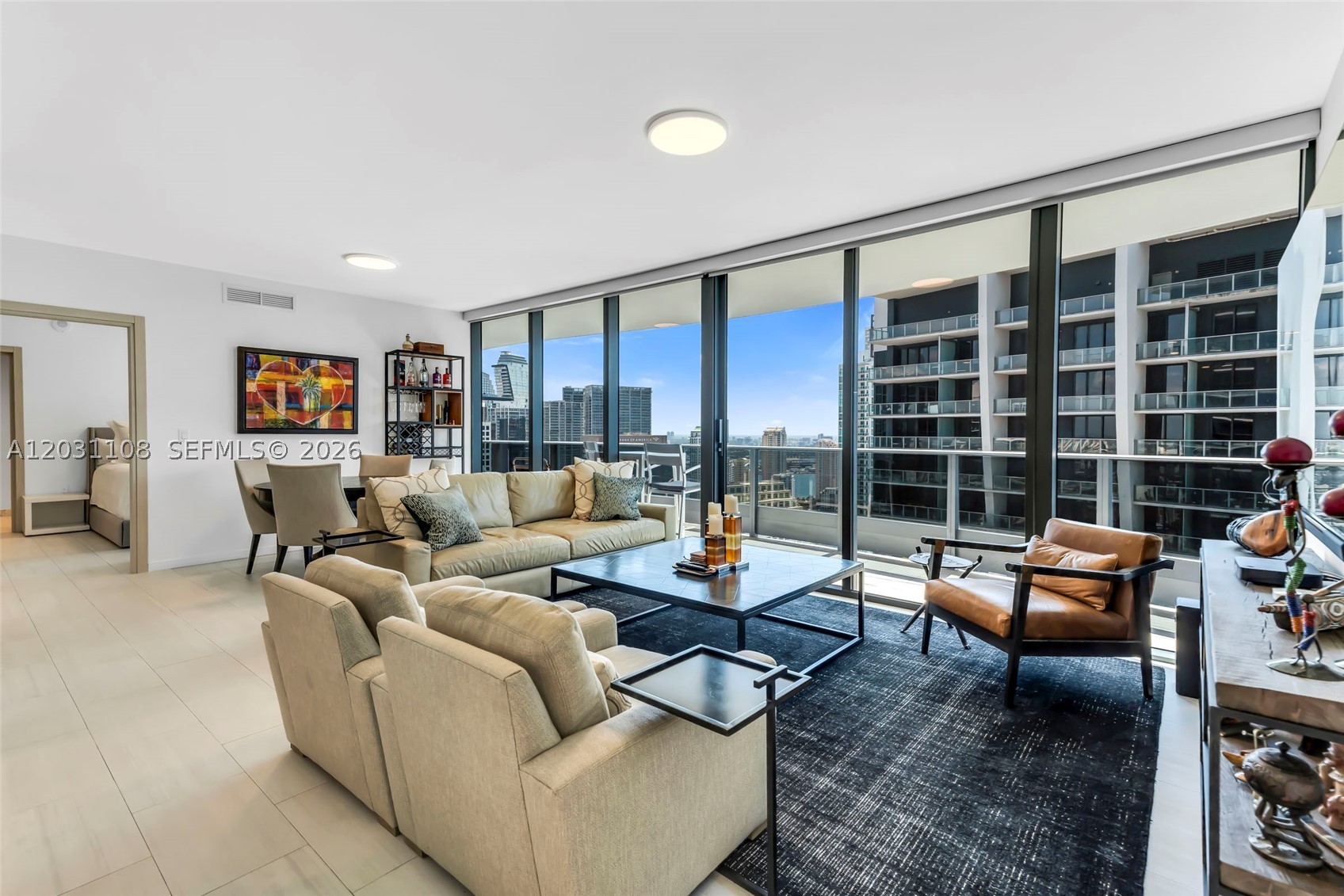 Exceptional 2 bedroom, 2.5 baths residence in Brickell Flatiron, priced to sell fast. Unit faces east and has an ideal split plan, designed for both comfort and privacy. This thoughtfully designed layout offers generous living spaces, seamless flow and functionality, making it one of the most desirable floor plans in the building. 
Unit features Casagrande Padana ceramic floors, BARAUSSE doors, Miele stainless steel appliances, Snaidero cabinetry, Dorn Bracht fixtures, electric shades, built-in closets, laundry room with washer/dryer & pantry. Exceptional opportunity in Ugo Colombo's latest project, built in the middle of Brickell's Financial District. 
Includes 2 parking spaces, 1 assigned & one guaranteed valet.
Full service building with rooftop pool and jacuzzi, spectacular gym with sauna & steam, party room, business center, pool table, children's playroom, doorman, 24 hour security & lobby attendant, grocery & food runner, concierge services, management in house, valet parking.
Priced to sell fast.