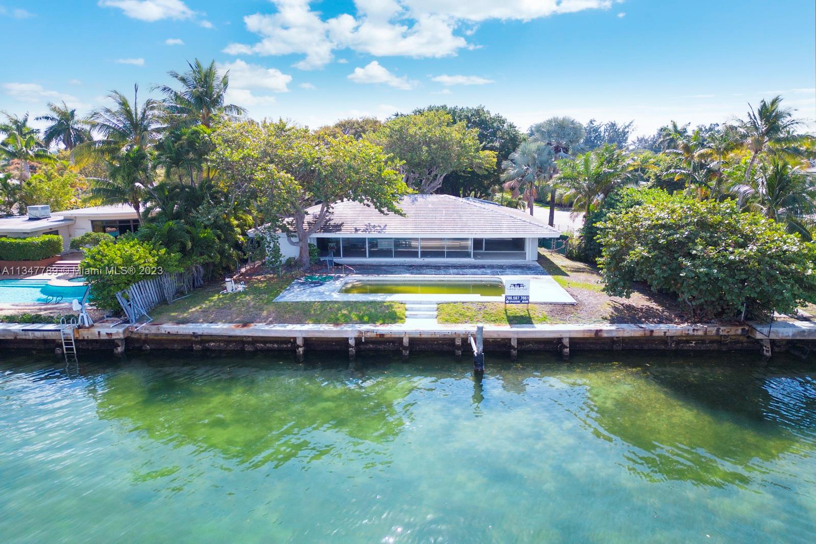 Stunning property for renovation of existing home or new build facing west with sunset views on private secure gated Normandy Island. Current interior of the home has been demolished ready for renovation. Oversized 14,422 sf lot with gorgeous unobstructed open bay views and 85 ft of waterfrontage. Normandy shores is one of the most highly sought-after gated communities in Miami Beach with an amazing golf course and clubhouse, tennis courts, playground and exercise area. It is centrally located just 15 minutes from Lincoln road, Bal Harbour, Aventura and close to MIA airport.