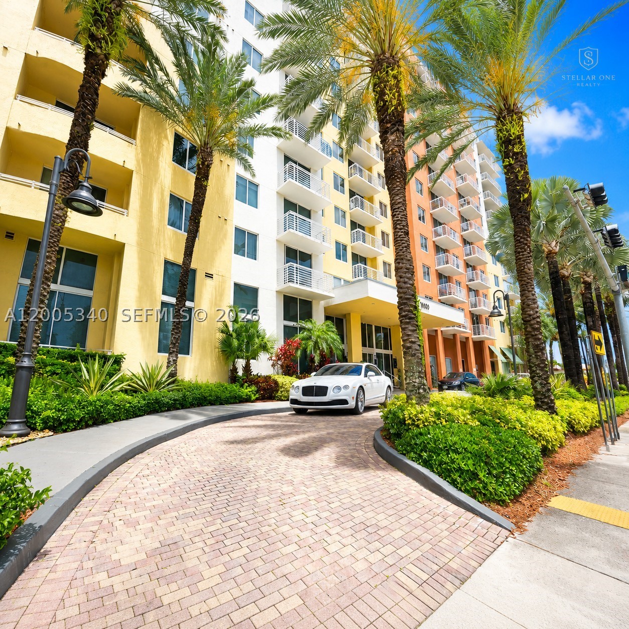 The largest 2-bedroom floor plan in Venture East, offering 1,252 square feet under A/C and a spacious split-bedroom layout that lives more like a home than a typical condominium. Bright and move-in ready, this residence features expansive living and dining areas, porcelain flooring throughout, walk-in closets, an in-unit washer and dryer, and a private covered balcony overlooking the resort-style pool and tropical landscaping.

Whether you're looking for a primary residence, seasonal retreat, or investment property, this home offers exceptional flexibility and value. Venture East residents enjoy two resort-style pools, a fitness center, clubhouse, business center, valet service, 24-hour security, and beautifully maintained grounds. Ideally located in the heart of Aventura, just minutes from Aventura Mall, Founders Park, Brightline, Gulfstream, beaches, restaurants, and top-rated schools.

One of the best opportunities to own the largest 2-bedroom model in one of Aventura's most convenient and desirable communities. Easy to show.