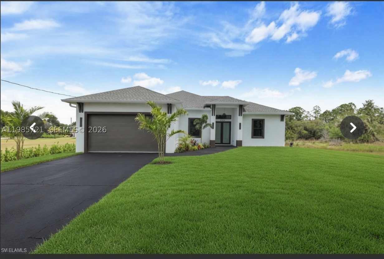 This brand-new 2026 home showcases a perfect blend of modern luxury and thoughtful design, featuring high-end finishes, premium top-of-the-line appliances, impressive 12.4-foot ceilings, and elegant 8-foot interior doors that enhance the sense of space and sophistication. Situated on a generous 1.16acre lot with a west-facing front, the property offers beautiful afternoon light and stunning sunset views. Designed for comfort, security, and energy efficiency, the home also includes hurricane-impact windows and doors for added peace of mind. 
 The home also features a timed sprinkler system surrounding the property for added convenience and landscape careand a Summer outside kitchen at the open lanai . NO HOA
Located in the rapidly growing Orange Tree /Oil Well area of Golden Gate Estates, the home is near exciting new retail developments, including a Publix-anchored shopping center, and just minutes from Big Corkscrew Island Regional Park. Walking distance to Golden gate estates elementary. Enjoy convenient access to Naples beaches, downtown, and nearby destinations such as Ave Maria, Fort Lauderdale, and Miami.
This property offers an exceptional combination of space, convenience, refined modern living.
REALTORS READ BROKERS REMARKS PLEASE