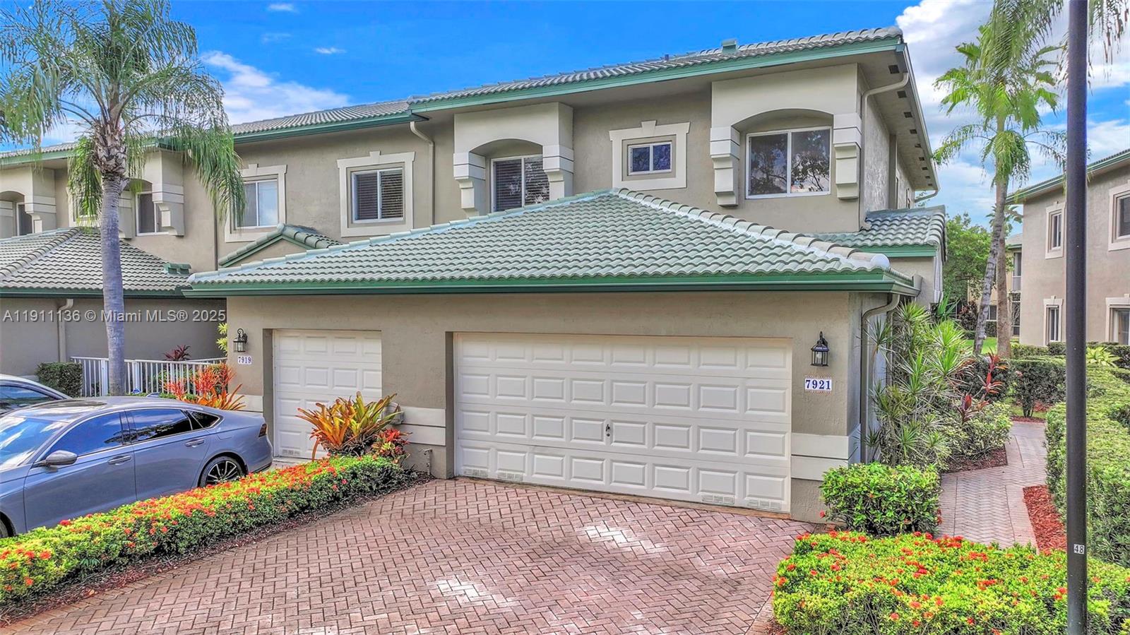 Enjoy resort-style living in this bright and spacious 3/2 corner coach home featuring a private elevator and a 2-car garage, located in one of the area’s most desirable 55+ communities. The open-concept living and dining areas are filled with natural light, creating an inviting space for relaxation and entertaining. The primary suite offers dual vanities, a walk-in closet, an oversized secondary closet, and the peace of mind of a brand-new 2025 roof. Experience exceptional amenities designed for an active lifestyle - including a clubhouse, indoor and outdoor heated pools, tennis and pickleball courts, a theater, and fitness and art classes —all within a gated community with 24-hour security. All assessments are paid in full. Move-in ready- just bring your suitcase and enjoy the lifestyle!