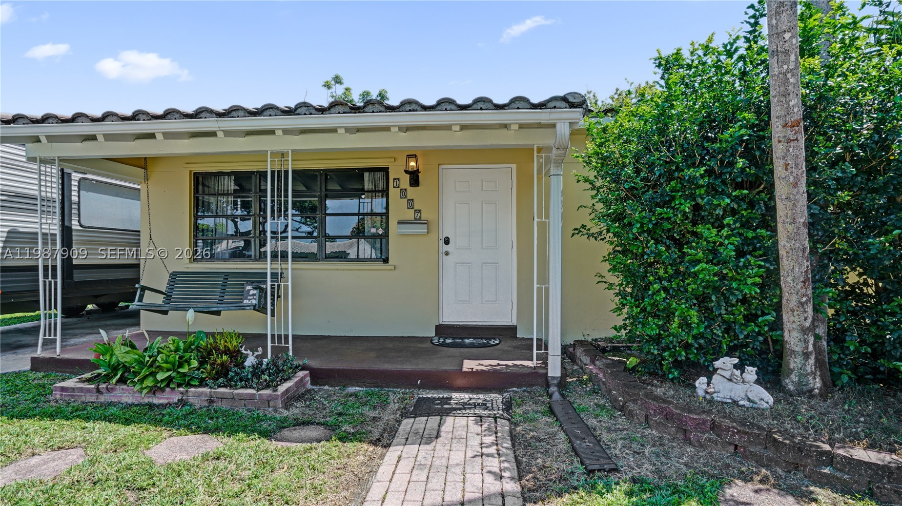 Charming 3-bedroom, 2-bath Hollywood home ideally located just a short bike ride to Hollywood Beach, Hollywood Blvd, the YMCA, Farmers Market, Rotary Park, and TY Park. The spacious backyard is perfect for relaxing or entertaining, featuring a swing set, mature avocado tree, and a 2021 all-metal 10x16 ft Lark shed. Inside, brand new vinyl flooring (2026) flows throughout, giving the home a fresh, modern feel. Enjoy year-round comfort with central AC (2021) plus a split unit in the primary bedroom (2024). The primary bathroom was fully updated in 2022. A long driveway offers ample space for an RV/boat and multiple vehicles, while a mango tree in the front yard adds to the home’s charm. The house is connected to a gas line for added efficiency with a gas range and water heater. This well-maintained property is truly move-in ready! NO HOA