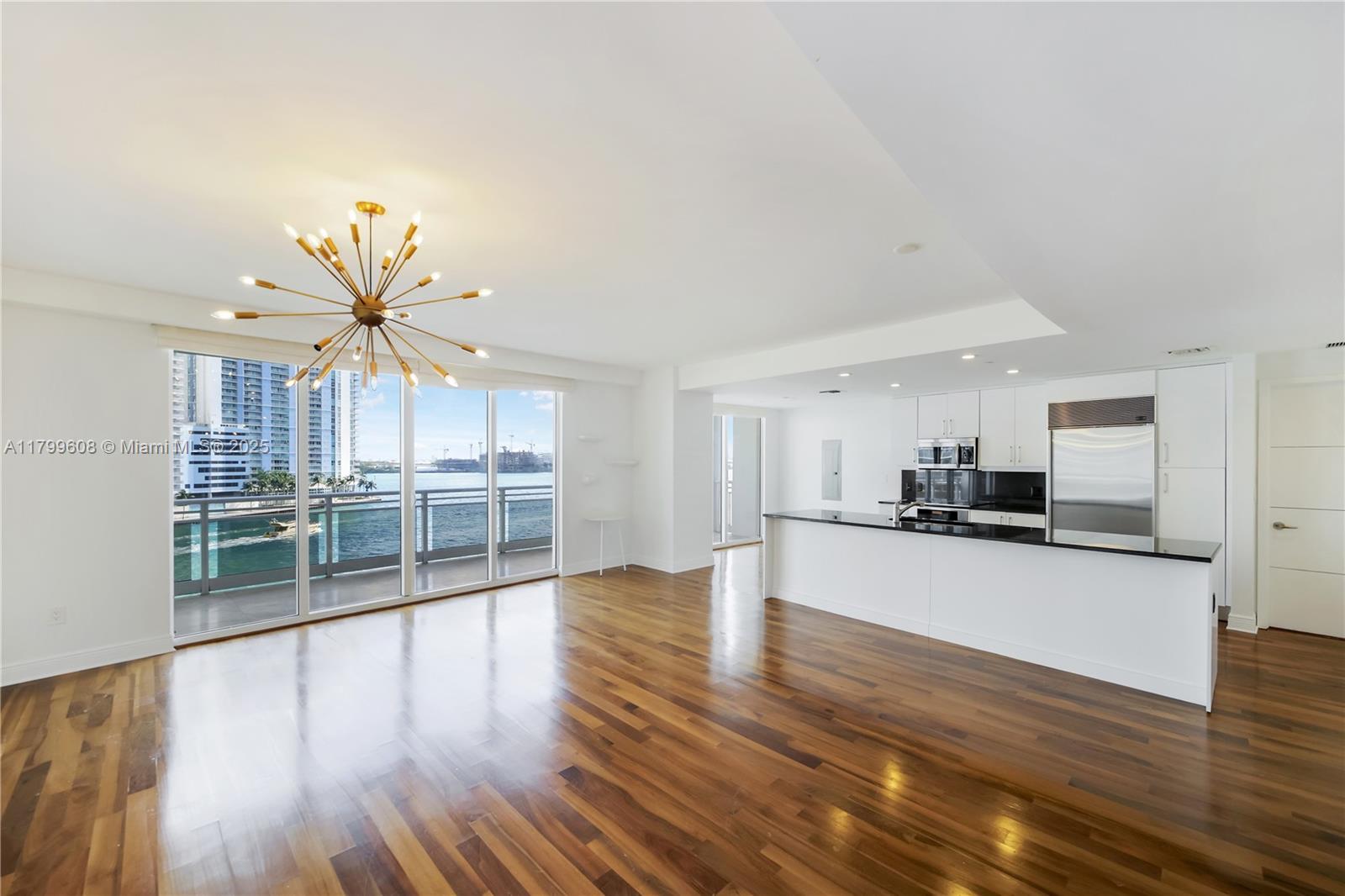 Live the ultimate waterfront lifestyle at Carbonell 607 on exclusive Brickell Key. This expansive 2-bed, 2.5-bath (1,784 sqft) is the largest model, with rare low-floor proximity to the bay—feel the water, don’t just view it. Wake up to stunning Biscayne Bay views from every room. The split layout offers two private suites and a central space perfect for entertaining or relaxing in style. Step onto the oversized balcony and unwind as boats drift by. Enjoy resort-style amenities: tennis, racquetball, infinity pool, gym, BBQ, kids’ play area & more. In a secure, double-gated island oasis just steps from Brickell’s energy, this home blends serenity with sophistication. No special assessments. Solid HOA. A place to live well—and love where you live.