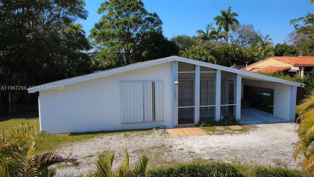Great opportunity in the highly sought-after Biscayne Park neighborhood. This property offers over a quarter of an acre in one of Miami's fastest growing residential areas. Biscayne Park is becoming increasingly exclusive. This very well kept 2-bedroom, 2 bath property offers a renovated, modern kitchen with stainless steel appliances, newer A/ C, water heater, and storm shutters. Big land-value opportunity for developers or investors. Buyer to verify zoning. Located next door is a 12-unit multifamily. Don't miss this great opportunity.