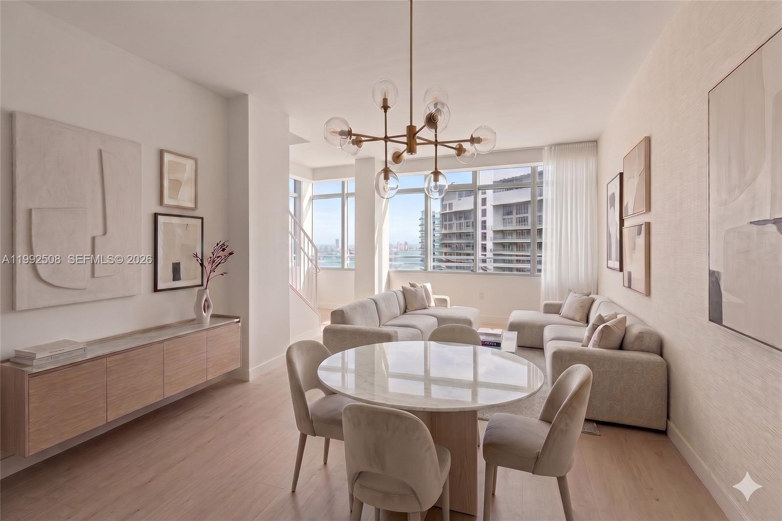 Rare penthouse duplex opportunity in the heart of Brickell’s financial district. This 1,427 SF residence features soaring double-height ceilings and breathtaking bay views, offering a sense of scale and volume rarely found in the area.

Delivered decorator-ready and ready for buildout, it serves as a blank canvas to design a bespoke luxury penthouse, providing significant value-add potential for investors or design-driven end-users.

Located in a premier building with no rental restrictions, this unit is perfectly positioned for short-term rentals (Airbnb) or participation in the AKA Hotel program. Residents enjoy world-class amenities, including an 11-story sky lobby, resort pool, spa, and fitness center, all within steps of Brickell’s top dining and nightlife.

Strategically priced for the buyer who understands vision, customization, and long-term upside in Miami’s most vibrant neighborhood.