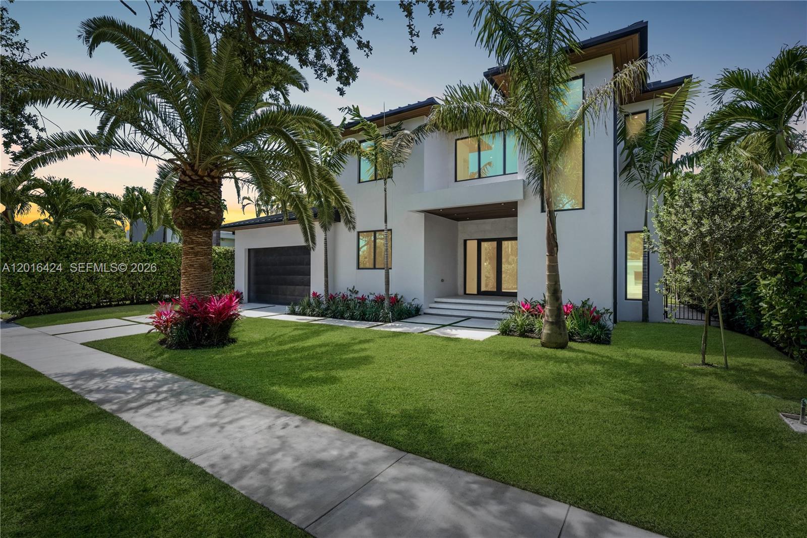 Brand-new completed construction in the prestigious guard-gated community of Keystone Point. This exceptional 2-story pool home features 4 bedrooms, 4.5 bathrooms, and en-suite baths in every bedroom. Curated with sophisticated designer finishes throughout, the residence showcases large-format 48” porcelain flooring, 8-foot interior doors, hurricane-impact glass, and a sleek metal roof. Elevated construction provides added peace of mind. The chef’s kitchen is a true centerpiece, appointed with premium Sub-Zero and Wolf appliances along with stunning Taj Mahal quartzite countertops and backsplash. Select bathrooms are elegantly finished with luxurious Onyx stone details, adding warmth and sophistication. Enjoy seamless indoor-outdoor living with a spacious covered patio overlooking the private pool, perfect for entertaining year-round. Complete with a 2-car garage and ideally located minutes from Bal Harbour, beaches, dining, and top-rated schools. Move-in ready in one of North Miami’s most sought-after communities.