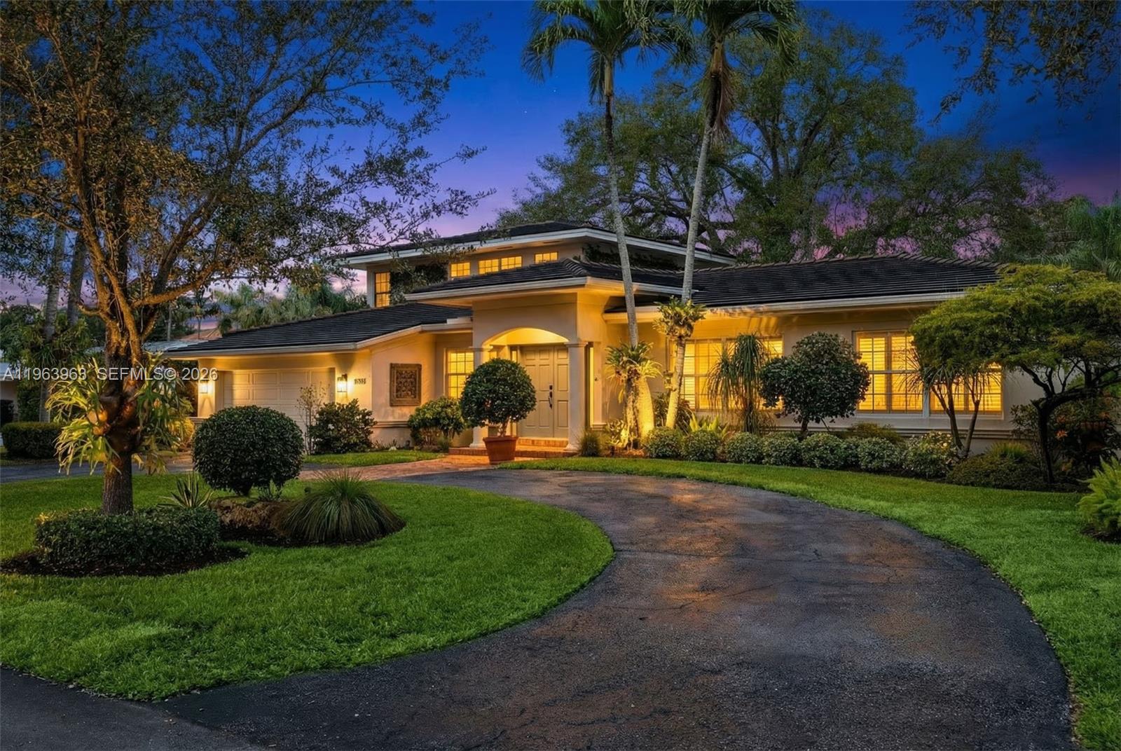 Beautifully maintained and thoughtfully designed, this inviting residence offers soaring double-height ceilings in the family room, creating a bright and open ambiance, while a fireplace anchors the living room with warmth and charm. Rich wood and marble floors run throughout, blending timeless elegance with everyday comfort. The home has 4 bedrooms, The first floor has 3 spacious bedrooms and 3 full bathrooms, while the private upstairs primary suite serves as a serene retreat complete with a sitting area, spa-inspired bath, and generous walk-in closets. Designed for effortless indoor-outdoor living, the brick patio and covered terrace overlook the pool, creating an ideal setting for entertaining. Speakers in the main living areas and outdoors enhance the experience. Additional highlights include  double-pane windows, a generator, built-in garage workstation, exterior storage closet, and sprinkler system. A refined and functional home ready for its next chapter.