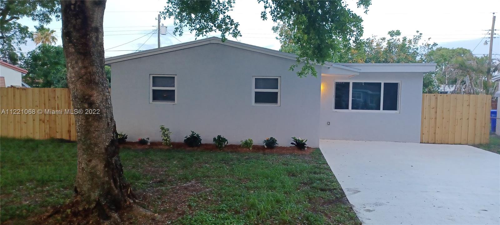 COZY 4/2 IN HOLLYWOOD LARGE ROOMS, TILE THROUGHOUT GREAT NEIGHBORHOOD SPLIT PLAN WITH LARGE PATIO & FENCED IN YARD AND PLENTY OF PARKING TILE FLOORING THROUGH OUT NICE KITCHEN WITH QUARTZ AND TILE BACK SPLASH & LIGHTING, WALKING DISTANCE TO GOOD SCHOOLS, PLENTY OF STORAGE WITH AN ADDITON BUILT IN 11/2018 INCLUDES NEW MASTER BEDROOM, 2 REMODELED BATH & CABINETS TOILETS. NEW FAMILY ROOM 2018. NEW 40 GAL WATER HEATER 2022, ELECTRICAL PANEL OUTLETS AND SWITCHES UPDATED IN 2018, ROOFING 2016 & 2018, AIR CONDITIONER 3.5 TON 2018 VENTS 2022, WALLS RE-STUCCO & PAINTED 2018, INTERIOR PAINTED 2022, NEW IMPACT WINDOWS AND DOORS 2018, NEW WINDOW COVERINGS 2022, DRIVEWAY 2017, PLUMBING 2018, THE HOUSE IS MOVE IN READY. AGRESSIVELY PRICED PROPERTY ALL OFFERS WELCOME. SEE SHOWING TIME