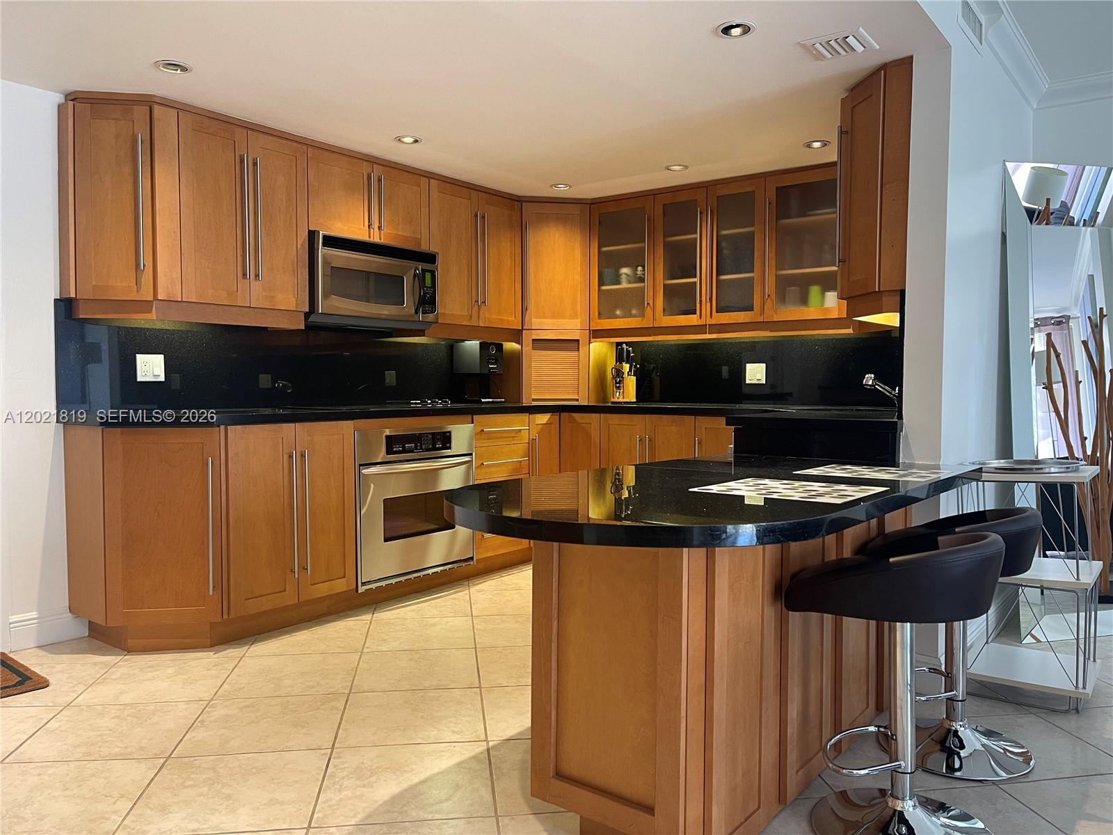 Beautiful and well-maintained 2-bedroom, 2-bath condo at Commodore South in Key Biscayne. This light and bright residence features tile flooring throughout, an updated open kitchen, and a spacious balcony perfect for relaxing. Enjoy a well-established oceanfront building with direct beach access, lush private grounds with a resort-style feel, pool, gym, party room, and BBQ area. Located in the Village of Key Biscayne, a private island community known for its charm, beaches, restaurants, parks, biking, tennis, golf, boating, and more.