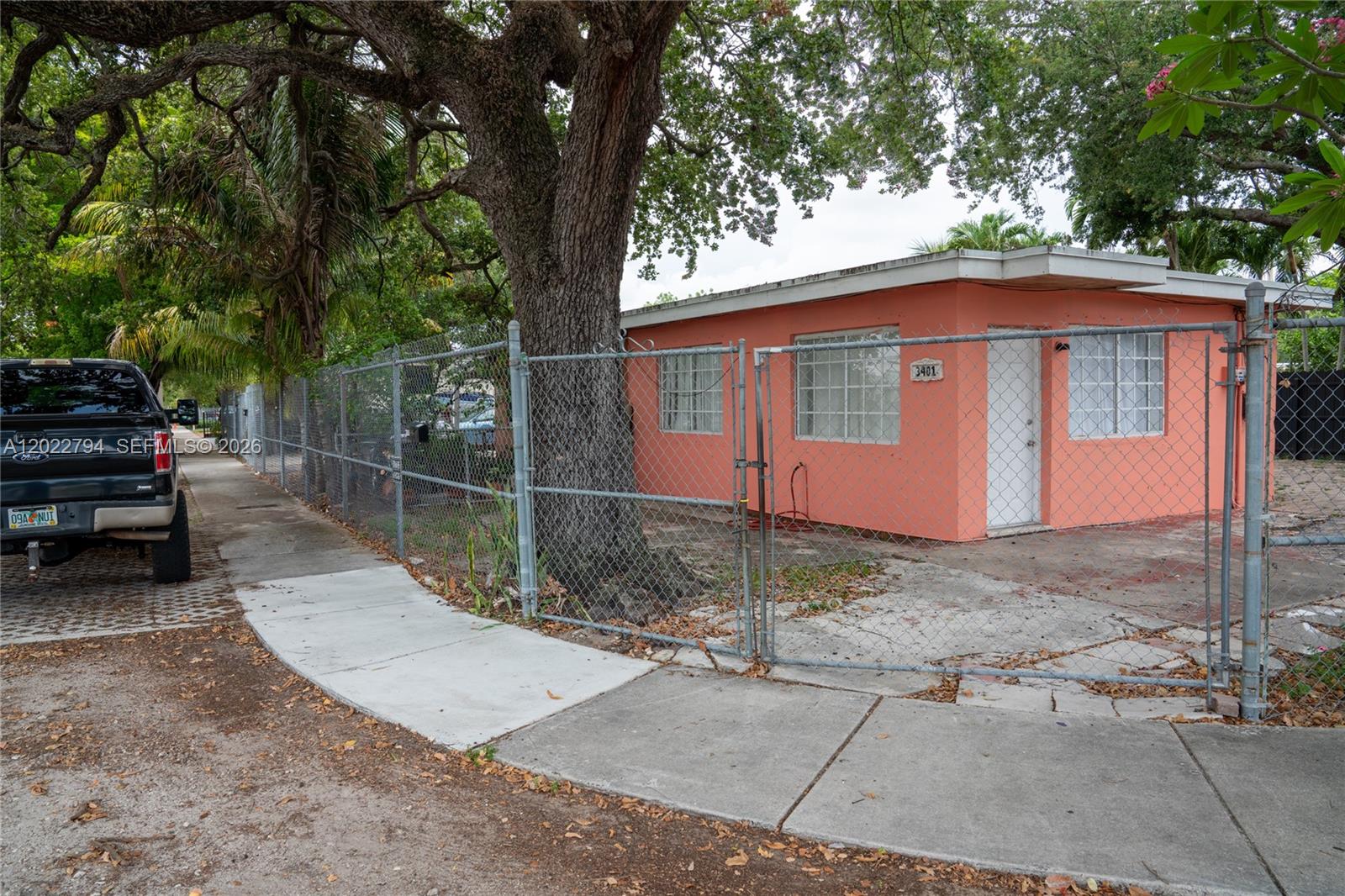 PRIME LOCATION – EXCELLENT INVESTMENT OPPORTUNITY! Centrally located in the highly desirable Grapeland Heights area, just minutes from Miami International Airport, major highways, Downtown Miami, Wynwood, and the future Miami Freedom Park & Inter Miami Stadium development. This corner lot duplex sits on approximately 6,612 Sq.Ft. in a T3-L zoning area and features two separate 1-bedroom, 1-bath units with independent electric meters. Each unit offers a functional layout with living room, kitchen, and dining/living combination area. Spacious fenced lot with abundant parking for multiple vehicles, vans, trucks, or RV parking. Great opportunity for investors, owner-occupants, or future redevelopment potential. Property is being sold As-Is.
Buyer to verify zoning, land use & all information independently. As-Is.