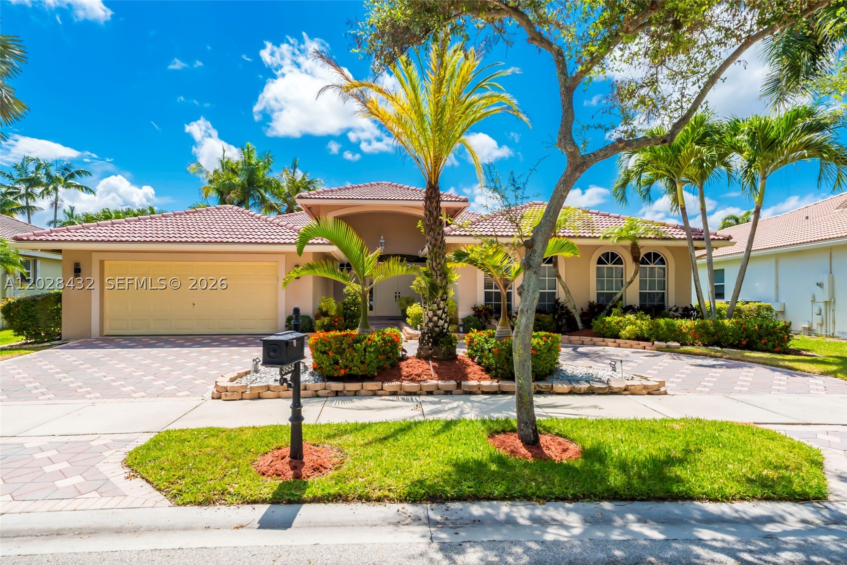 Beautifully updated and move-in ready, this exceptional 5-bedroom, 3-bathroom pool home plus office is located within a prestigious guard-gated community and offers the perfect blend of elegance and modern comfort. Featuring new porcelain flooring, a freshly painted interior, soaring ceilings, abundant natural light, and a circular driveway, this home makes an impressive first impression. The newly renovated chef's kitchen showcases beautiful granite countertops, updated cabinetry, and ample space for both everyday living and entertaining. The spacious primary suite serves as a private retreat with a spa-inspired bathroom and generous closet space, while the additional bedrooms are all generously sized and offer plenty of space for family and guests. Designed for seamless indoor-outdoor living, one of the guest bathrooms provides direct access to the pool area, perfect for entertaining and enjoying South Florida living. Step outside to your private backyard oasis featuring a sparkling resurfaced pool surrounded by lush landscaping. Residents enjoy resort-style amenities including tennis courts, a fitness center, community pool, top-rated schools, and convenient access to hospitals, shopping, dining, and major highways. Exceptional location, luxury, and lifestyle all in one—schedule your private showing today!