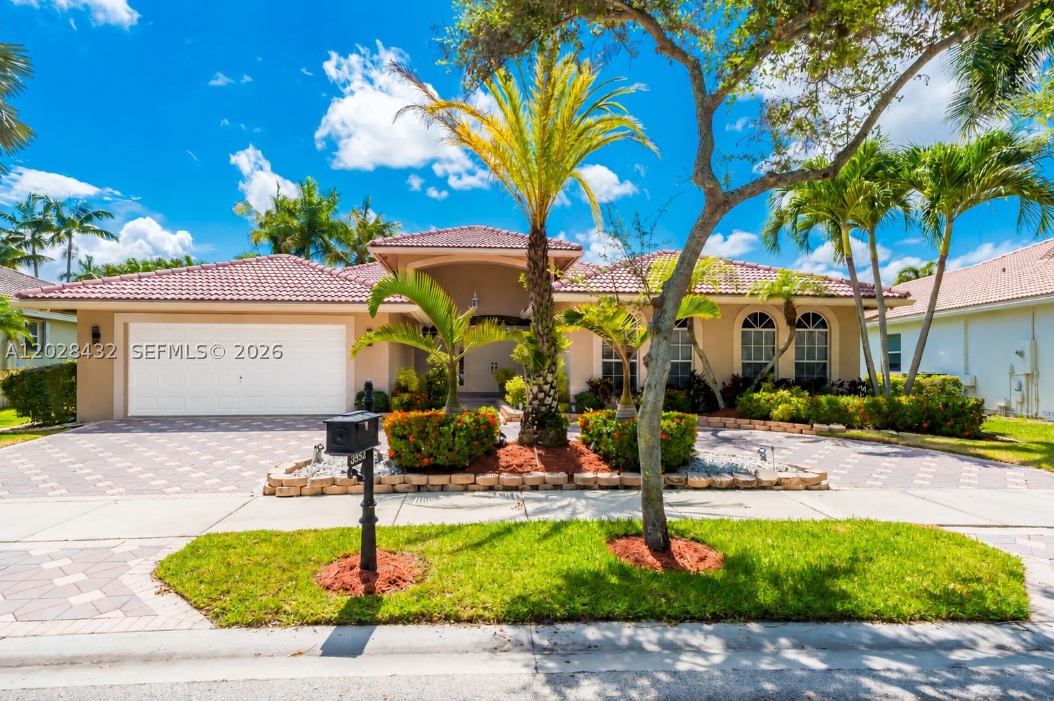 Beautifully updated and move-in ready, this exceptional 5-bedroom, 3-bathroom pool home plus office is located within a prestigious guard-gated community and offers the perfect blend of elegance and modern comfort. Featuring new porcelain flooring, a freshly painted interior, soaring ceilings, abundant natural light, and a circular driveway, this home makes an impressive first impression. The newly renovated chef's kitchen showcases beautiful granite countertops, updated cabinetry, and ample space for both everyday living and entertaining. The spacious primary suite serves as a private retreat with a spa-inspired bathroom and generous closet space, while the additional bedrooms are all generously sized and offer plenty of space for family and guests. Designed for seamless indoor-outdoor living, one of the guest bathrooms provides direct access to the pool area, perfect for entertaining and enjoying South Florida living. Step outside to your private backyard oasis featuring a sparkling resurfaced pool surrounded by lush landscaping. Residents enjoy resort-style amenities including tennis courts, a fitness center, community pool, top-rated schools, and convenient access to hospitals, shopping, dining, and major highways. Exceptional location, luxury, and lifestyle all in one—schedule your private showing today!